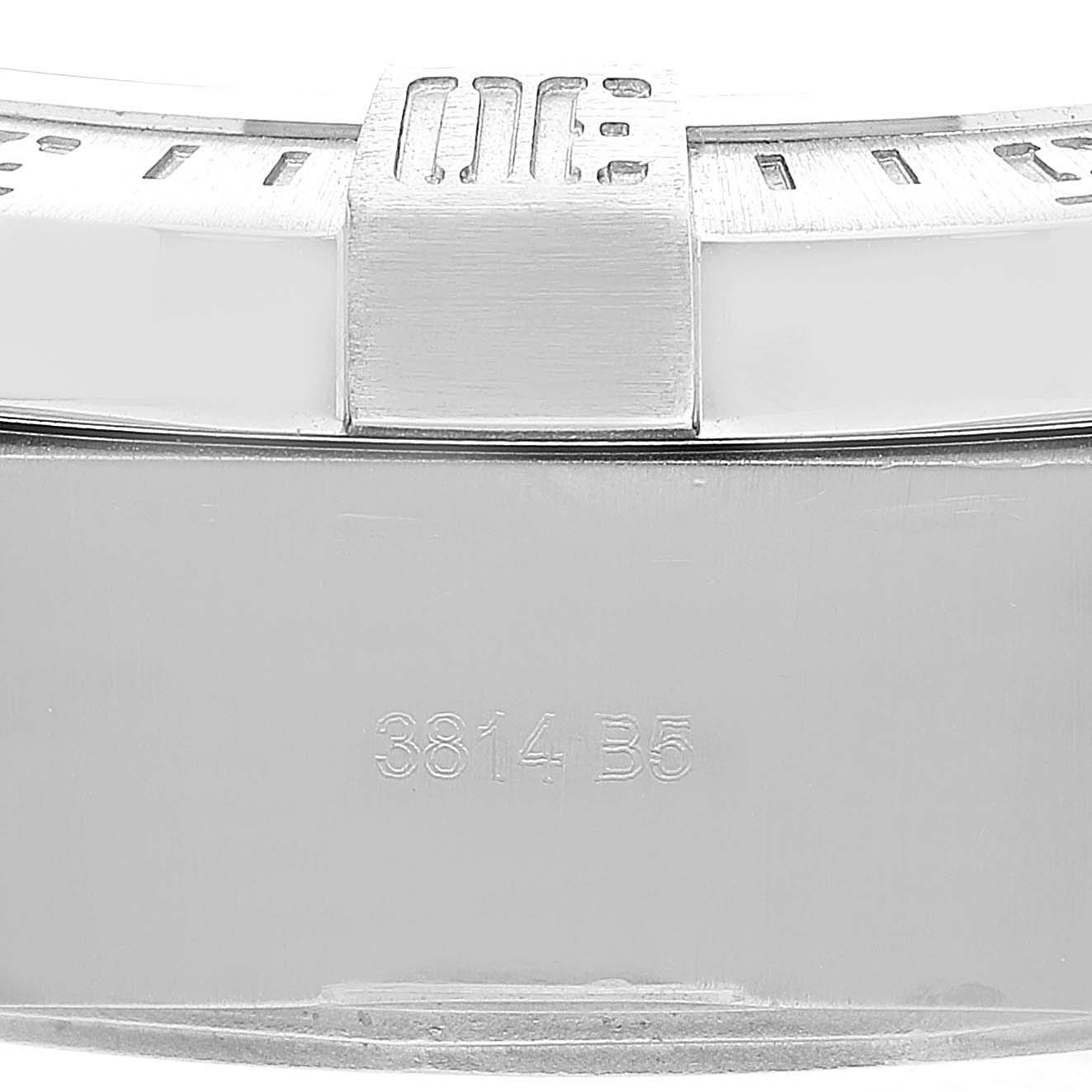 This image shows a close-up of the bezel and case of the Breitling Avenger A17331 Men's Stainless Steel Black Dial A17331 Men's Stainless Steel Black Dial watch, featuring a small section of the engraved part number.