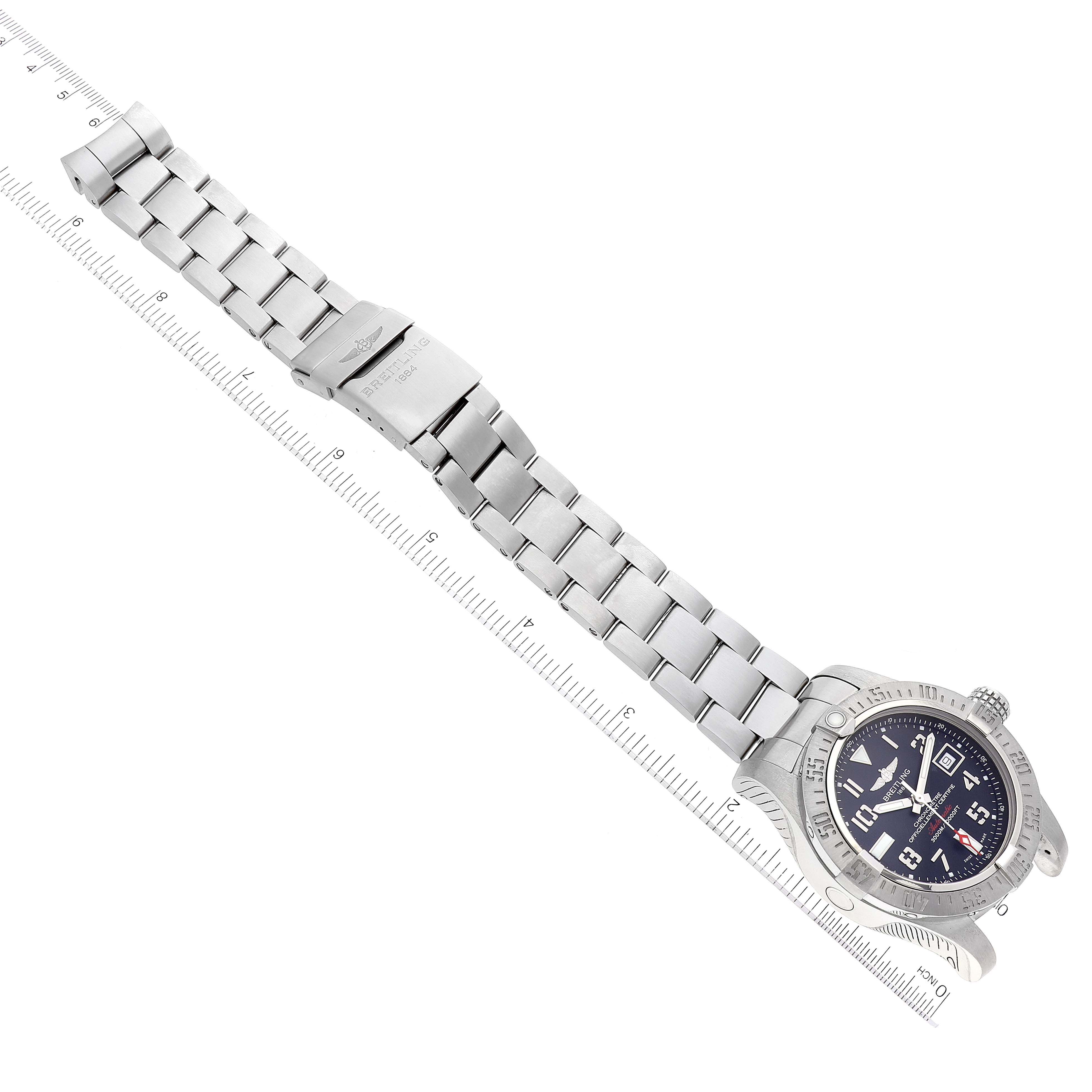The image shows the Breitling Avenger A17331 Men's Stainless Steel Black Dial A17331 Men's Stainless Steel Black Dial watch at an angled top-down view displaying its face, bezel, and metal bracelet with clasp.