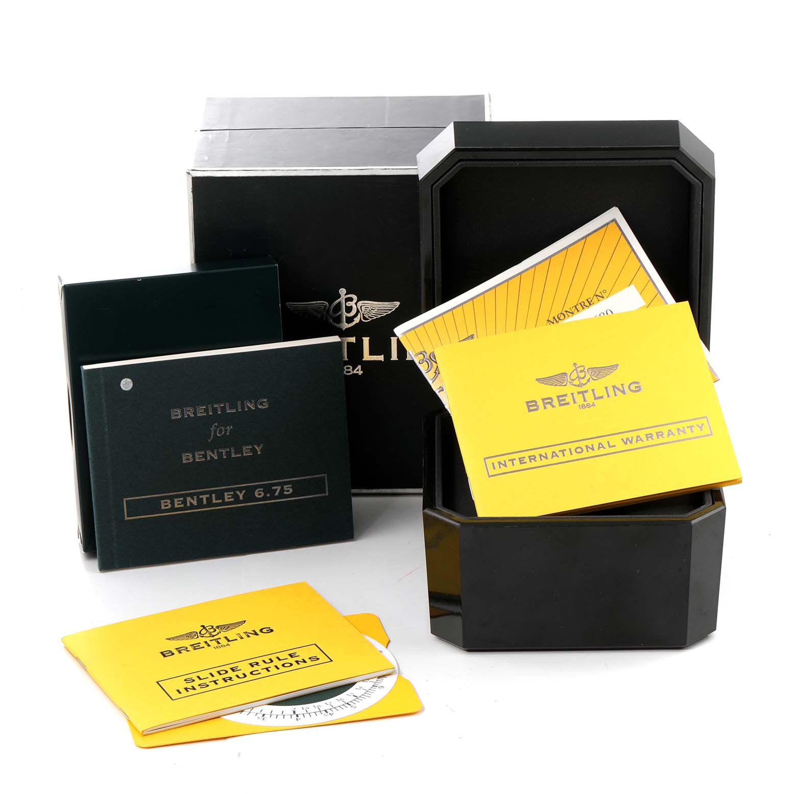 The image shows instructions, warranty card, box, and packaging for a Bentley model by Breitling.