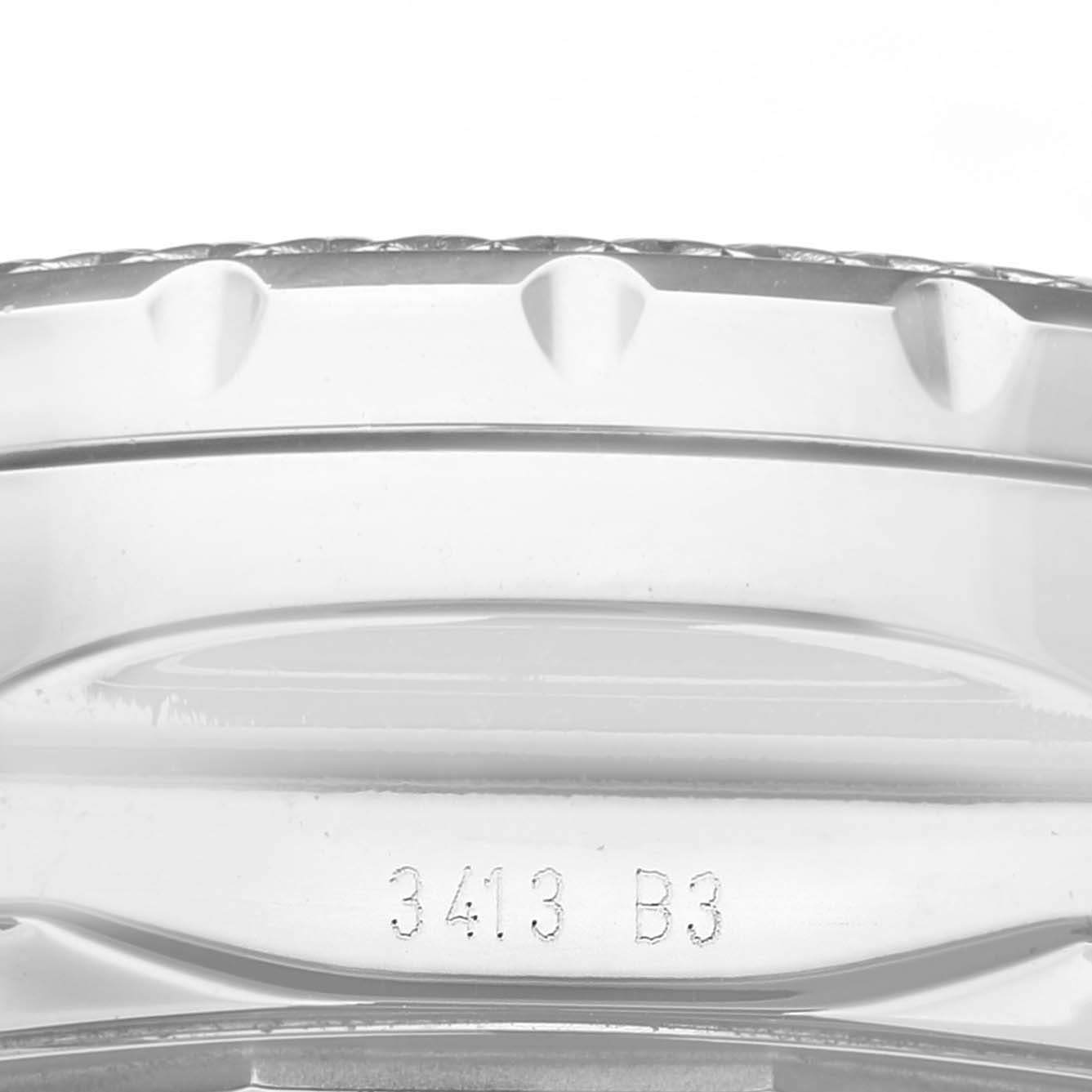 The image shows a close-up side view of the bezel and part of the case with engraving details of the Bentley model by Breitling.