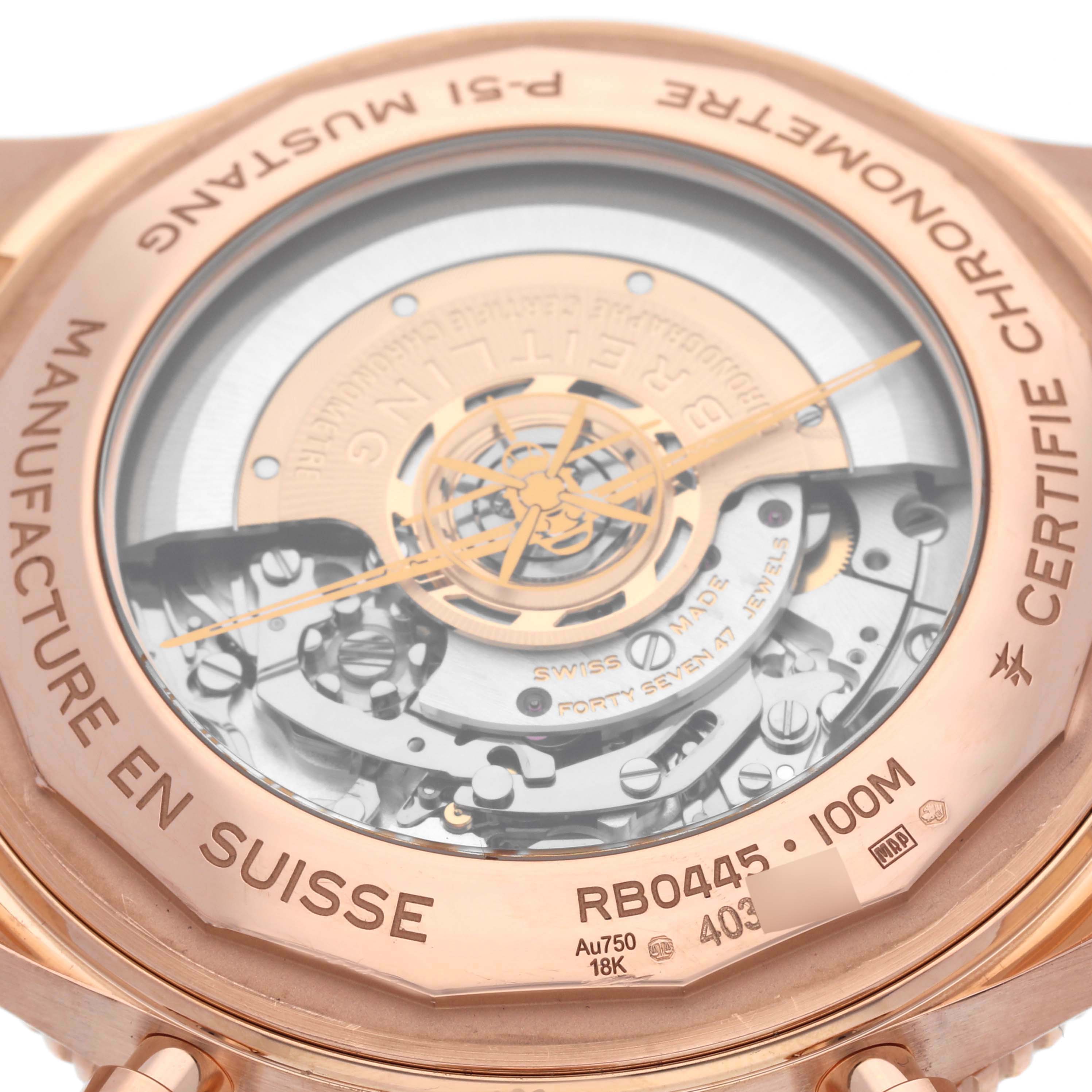 The image shows the back of a Breitling Aviator RB04451A1B1X1 Men's Rose Gold Grey Dial RB04451A1B1X1 Men's Rose Gold Grey Dial watch, highlighting its movement and inscriptions.