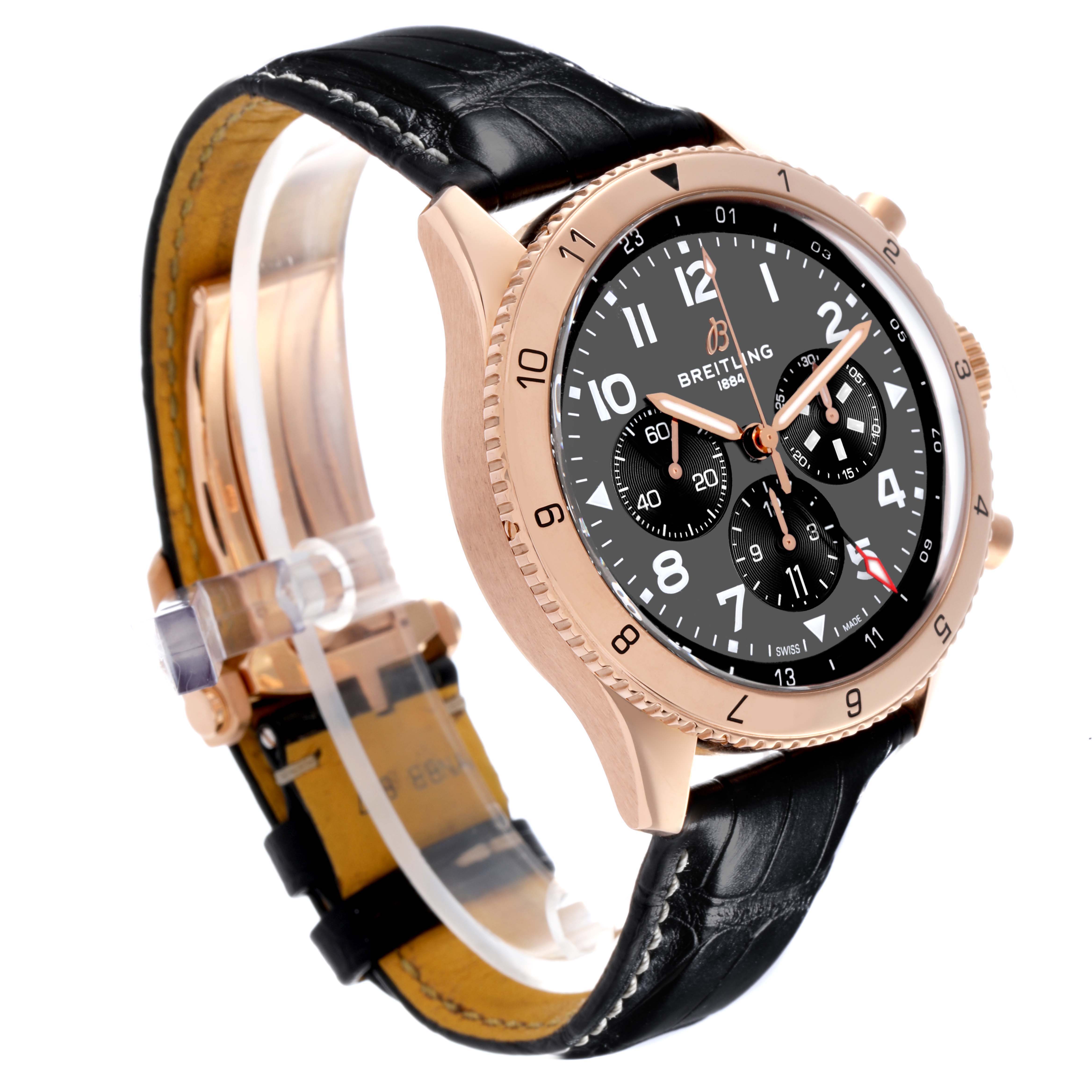 The Breitling Aviator RB04451A1B1X1 Men's Rose Gold Grey Dial RB04451A1B1X1 Men's Rose Gold Grey Dial watch is shown at a slight side angle, highlighting the face, bezel, and leather strap.