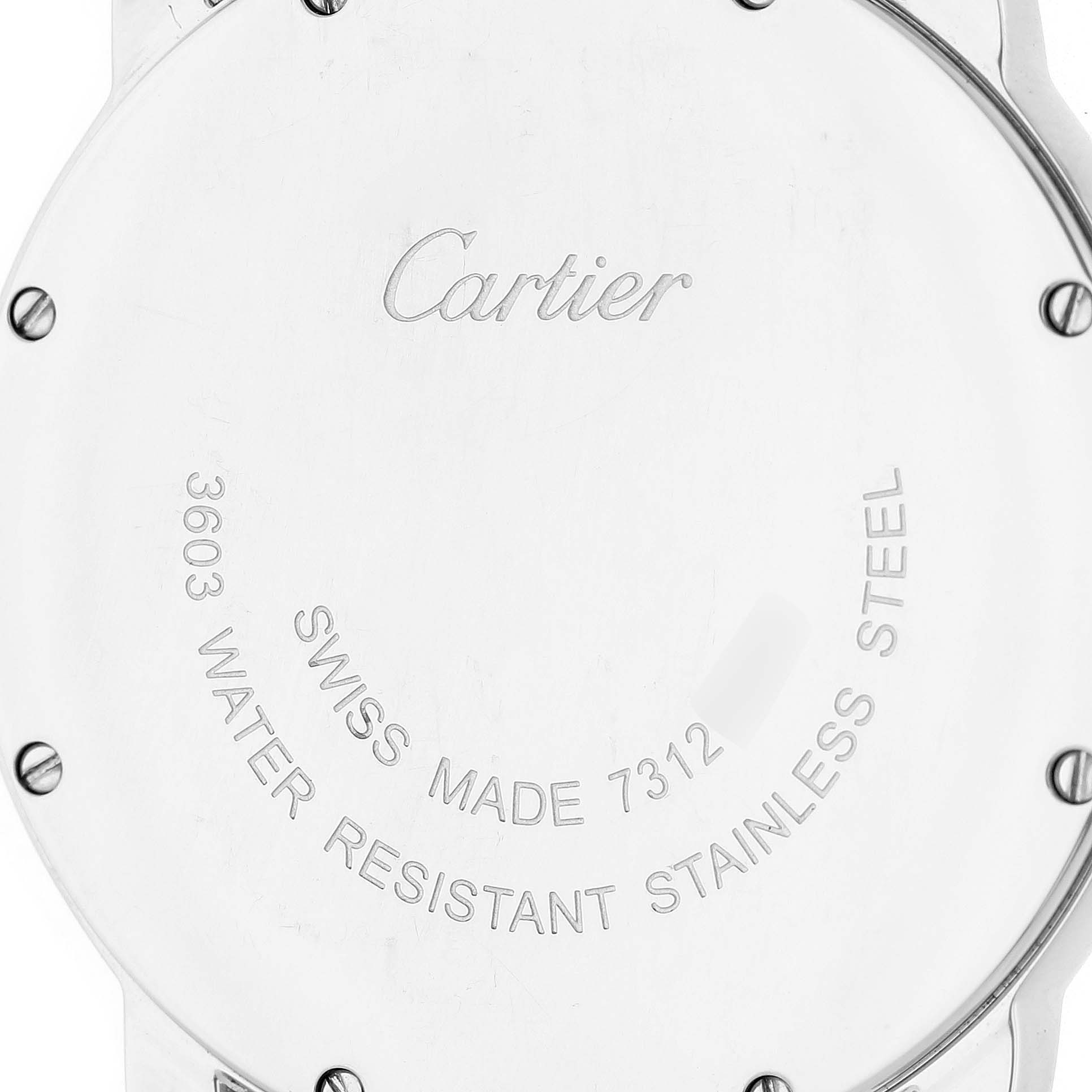 The image shows the back case of a Cartier Ronde W6701005 Men's Stainless Steel Silver Dial watch, highlighting engravings and screws.