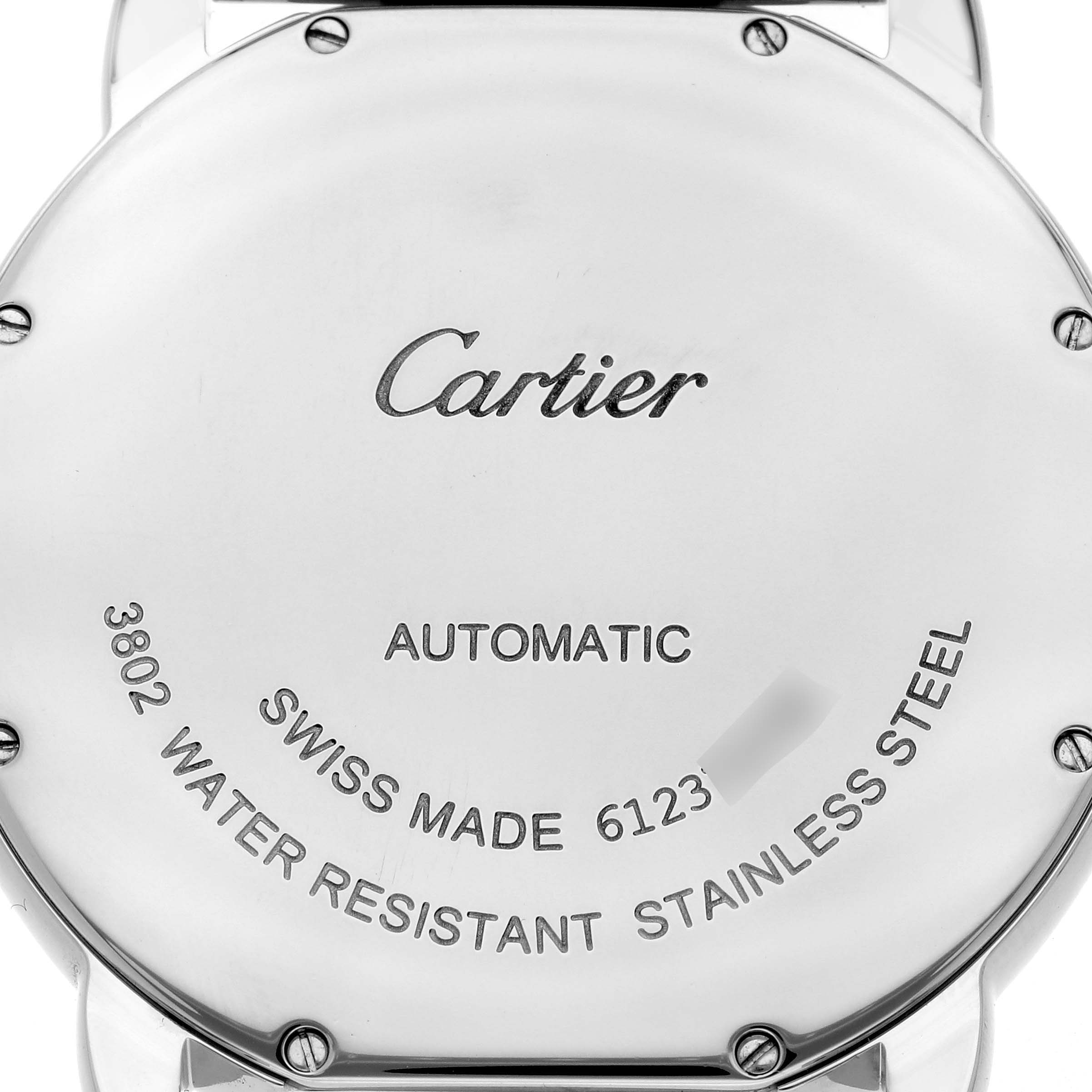 The image shows the back of the Cartier Ronde W6701011 Men's Stainless Steel Silver Dial W6701011 Men's Stainless Steel Silver Dial watch, featuring engravings and screw details.