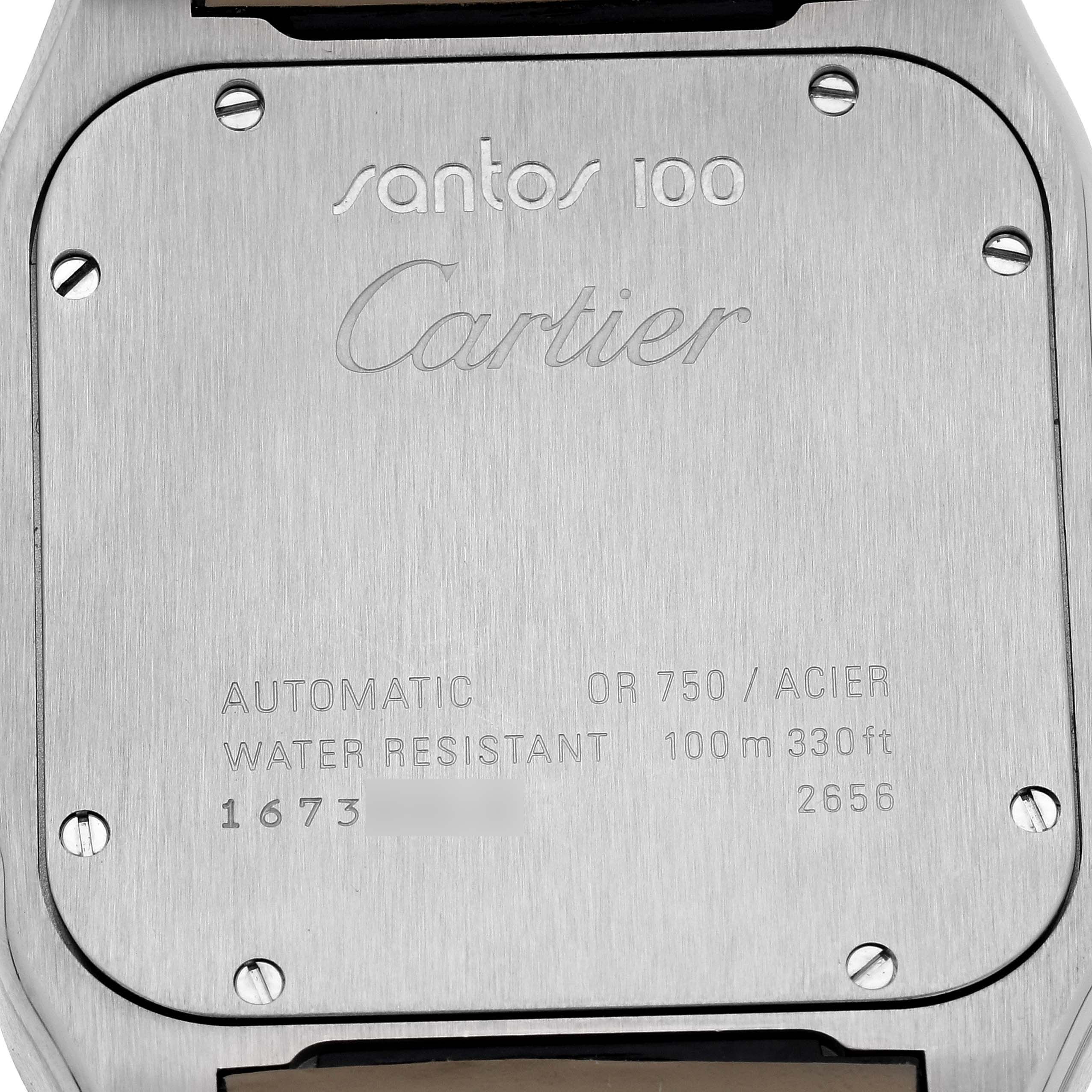 This image shows the back case of the Santos 100 automatic watch by Cartier, featuring engravings and securing screws.
