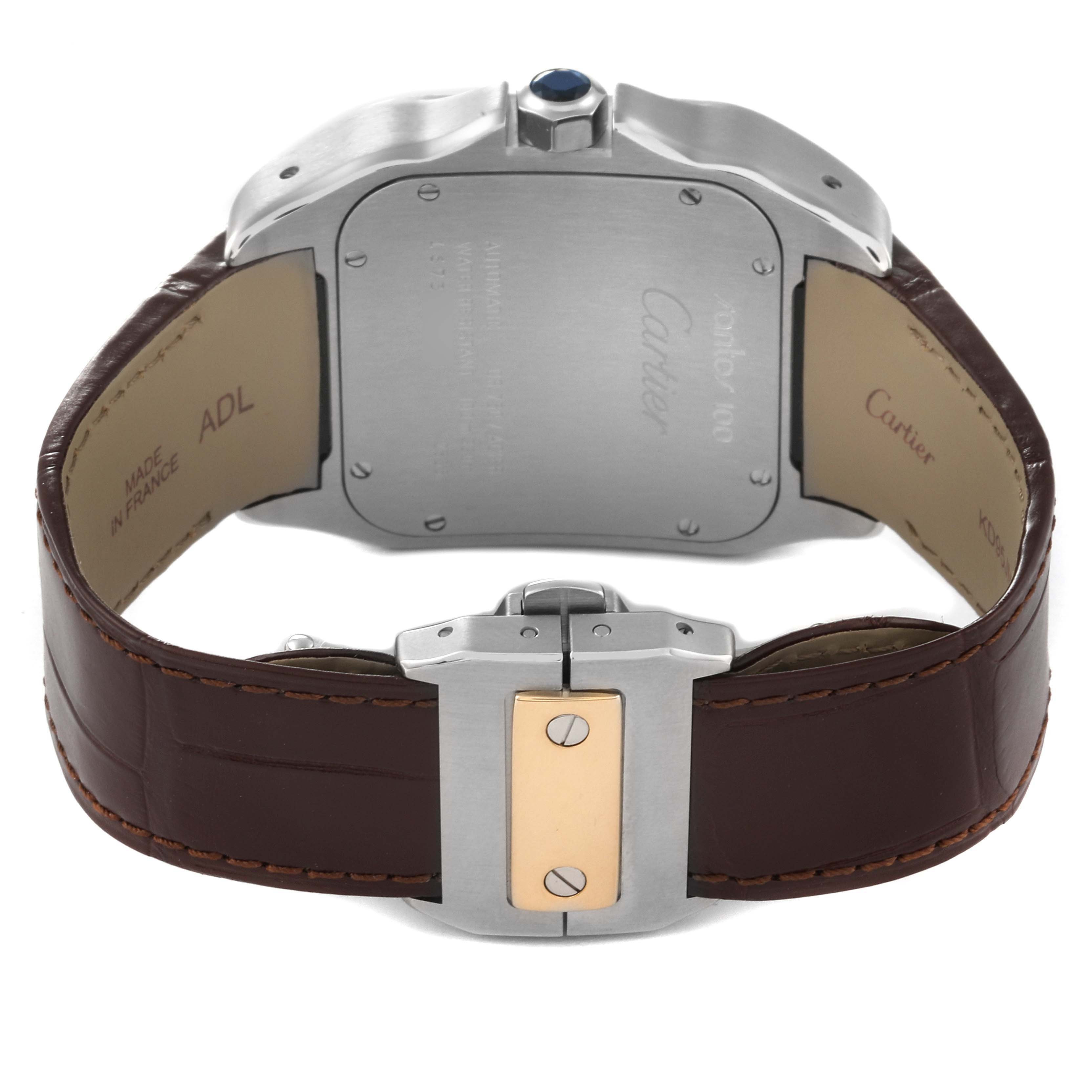 The image shows the back view of a Cartier Santos W20072X7 Men
s Stainless Steel Silver Dial W20072X7 Men
s Stainless Steel Silver Dial watch, including the case back, clasp, and brown leather strap.