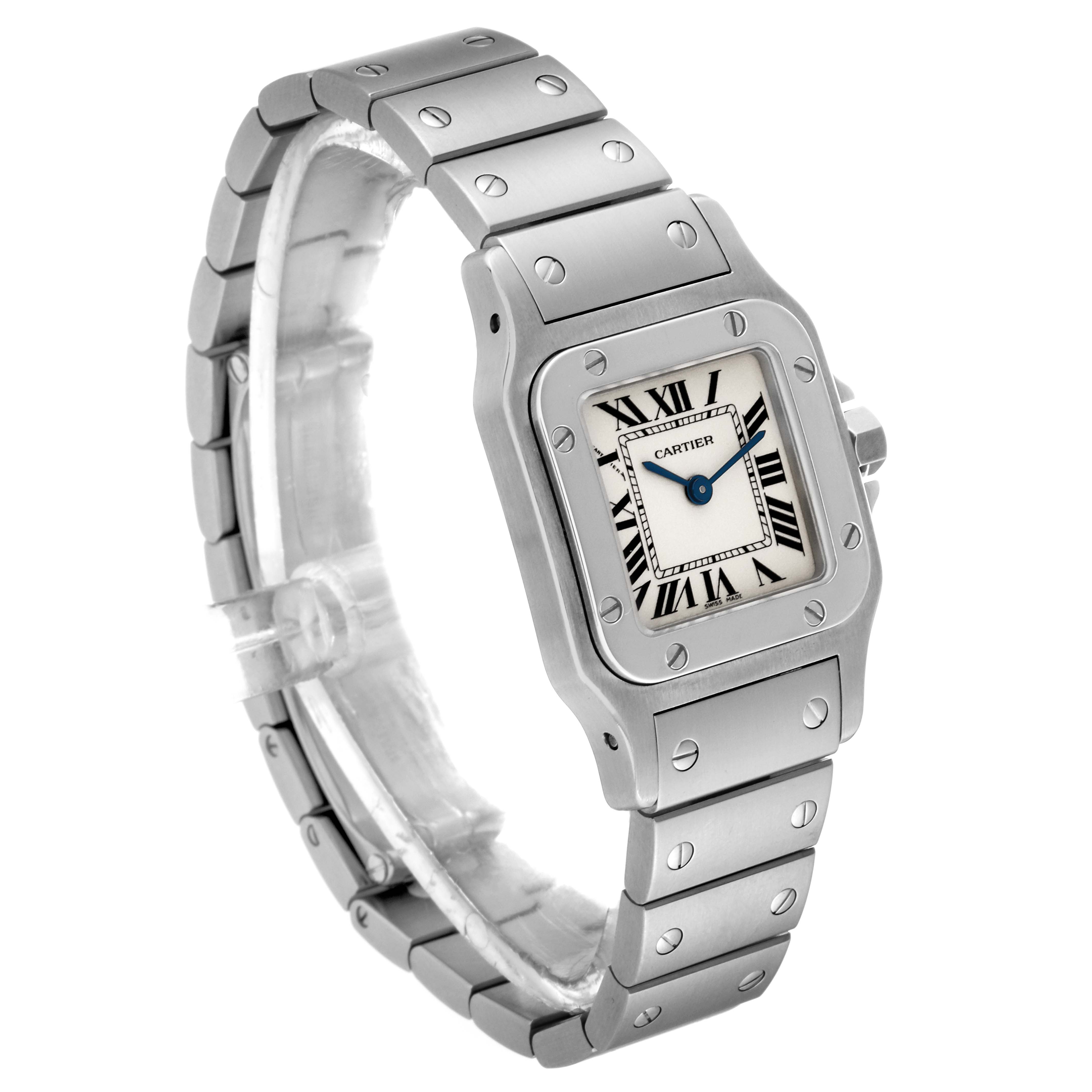The image shows a Cartier Santos W20056D6 Women's Stainless Steel Silver Dial W20056D6 Women's Stainless Steel Silver Dial watch at a three-quarter angle, highlighting the face, bezel, and metal bracelet.