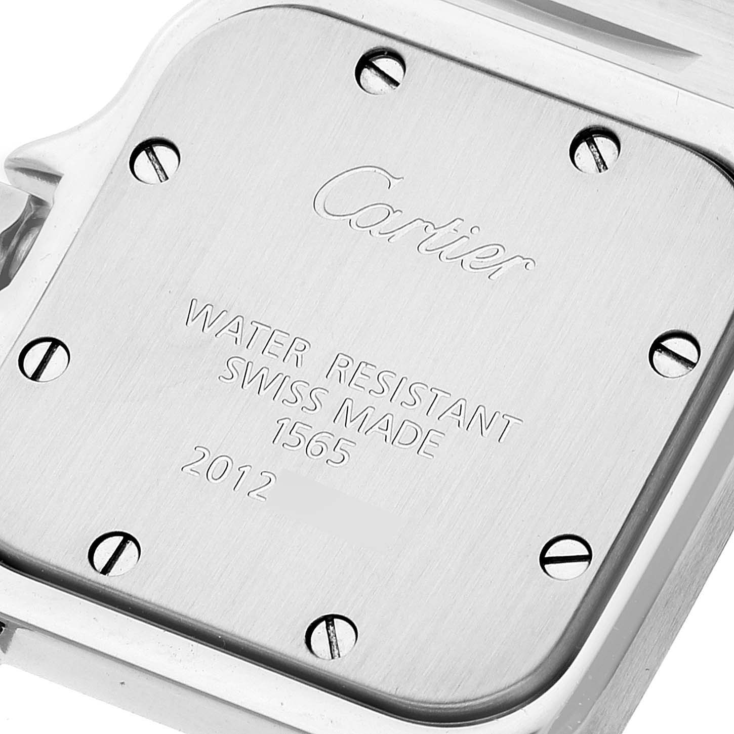 The image shows the back case of a Cartier Santos W20056D6 Women's Stainless Steel Silver Dial W20056D6 Women's Stainless Steel Silver Dial watch displaying branding and specifications.
