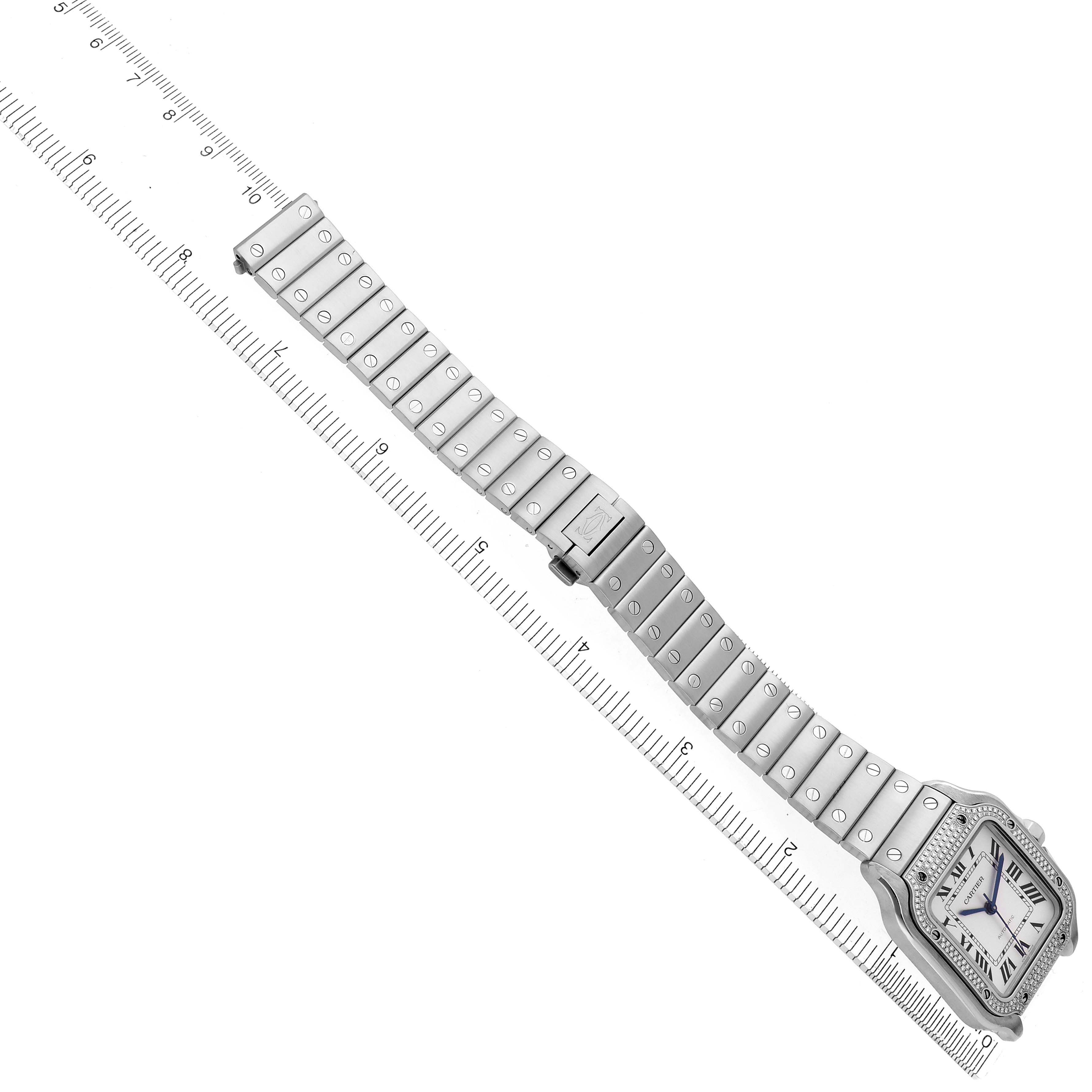 The Cartier Santos W4SA0005 Men's Stainless Steel Silver Dial W4SA0005 Men's Stainless Steel Silver Dial watch is displayed diagonally, showing the face, bezel, and full bracelet with a ruler for scale.