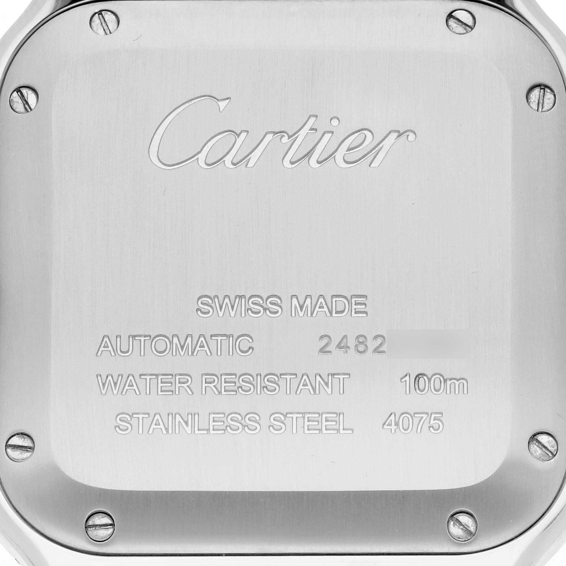 The image shows the back case of the Santos model by Cartier, highlighting its engravings and screws.