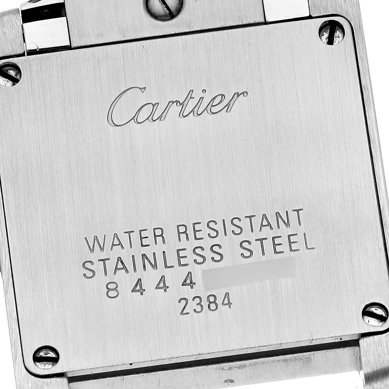 The image displays the case back of a Cartier Tank Francaise W51028Q3 Women's Stainless Steel Mother of Pearl Dial W51028Q3 Women's Stainless Steel Mother of Pearl Dial watch, showing the brand name and model information.