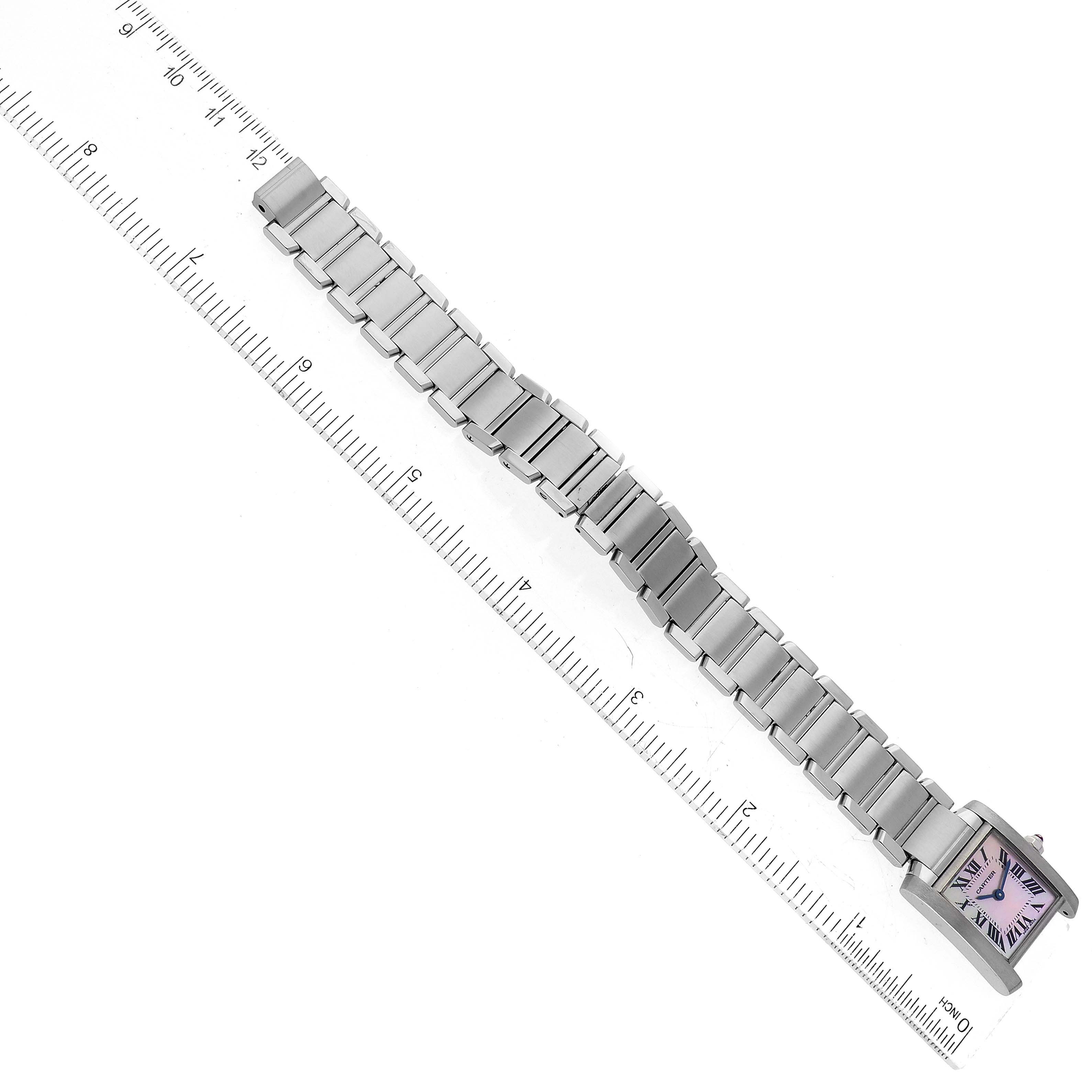 The image shows the full length and bracelet of a Cartier Tank Francaise W51028Q3 Women's Stainless Steel Mother of Pearl Dial W51028Q3 Women's Stainless Steel Mother of Pearl Dial watch, alongside a measuring ruler.