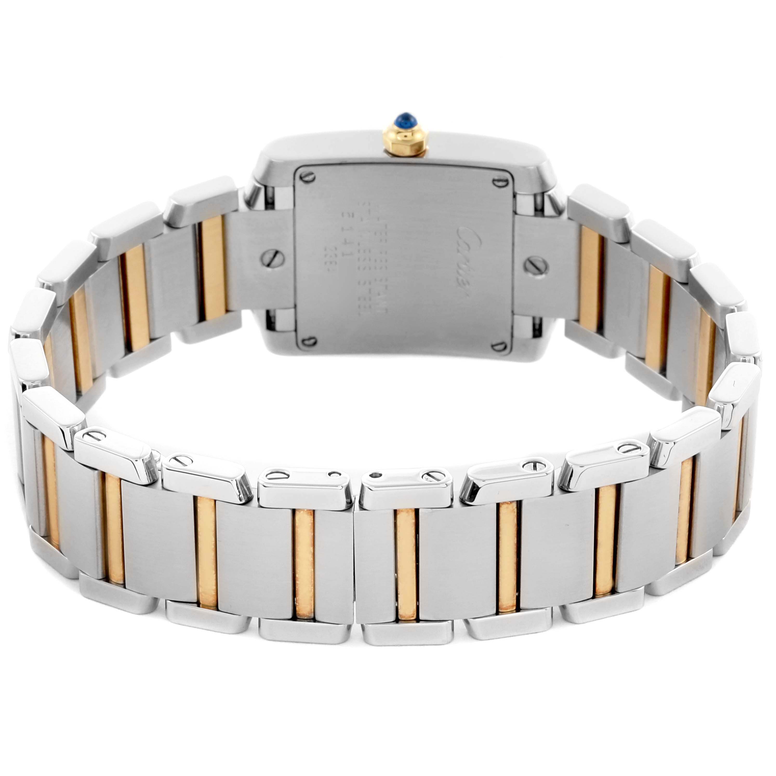 The image shows the back and bracelet of a Cartier Tank Française watch, highlighting its two-tone metal links.