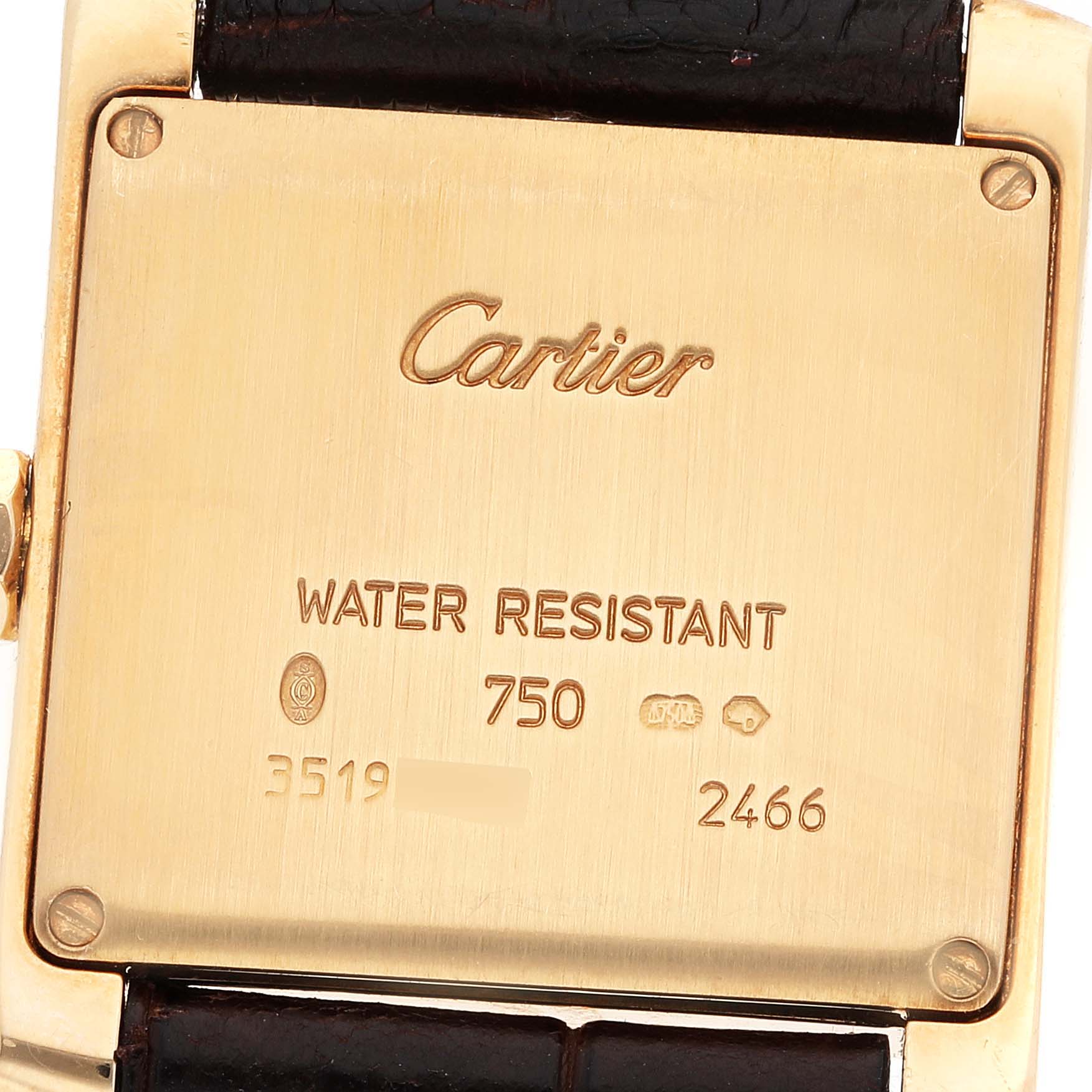 This image shows the back case of a Cartier Tank Francaise W5001456 Women's Yellow Gold Silver Dial W5001456 Women's Yellow Gold Silver Dial watch, featuring water resistance details and a leather strap.