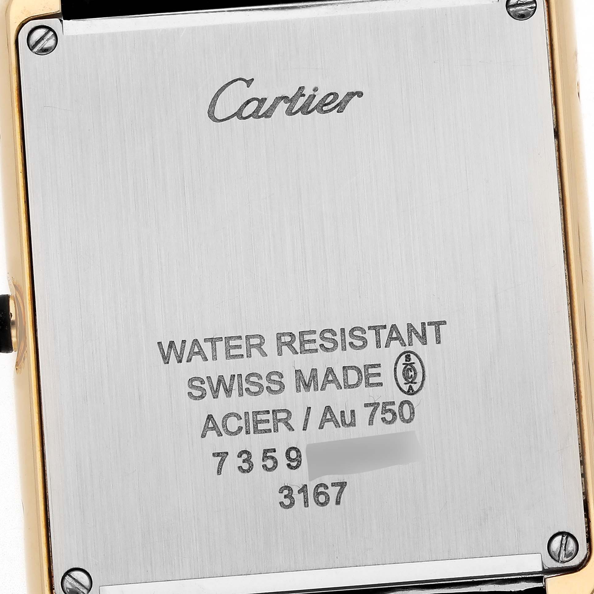 The image shows the back case of a Cartier Tank Solo W5200004 Men's Steel and Gold (two tone) Silver Dial W5200004 Men's Steel and Gold (two tone) Silver Dial watch, displaying brand engravings and specifications.