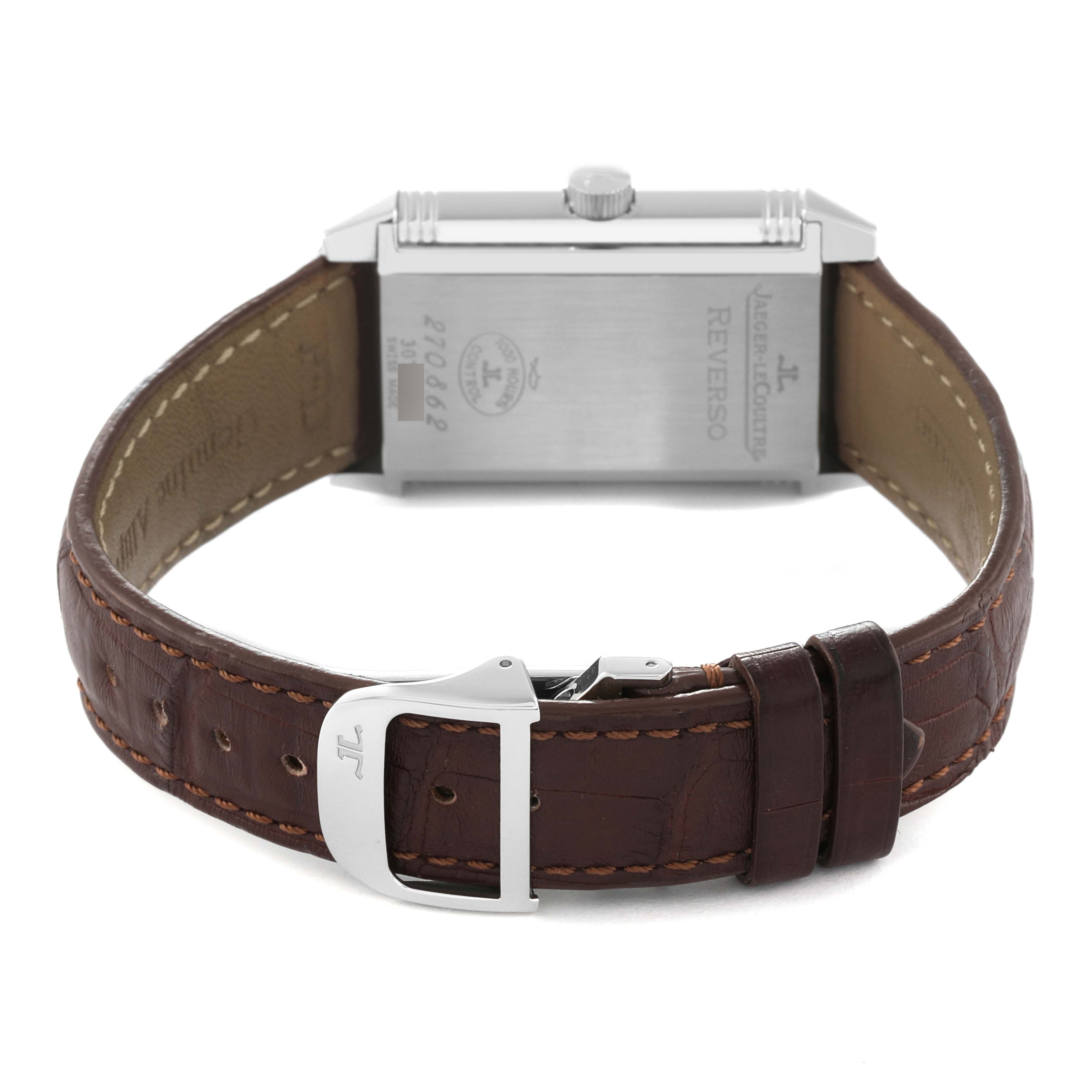 The image shows the back view of a Jaeger LeCoultre Reverso Q3858520 Men's Stainless Steel Silver Dial Q3858520 Men's Stainless Steel Silver Dial watch, focusing on its case back and brown leather strap with a buckle.