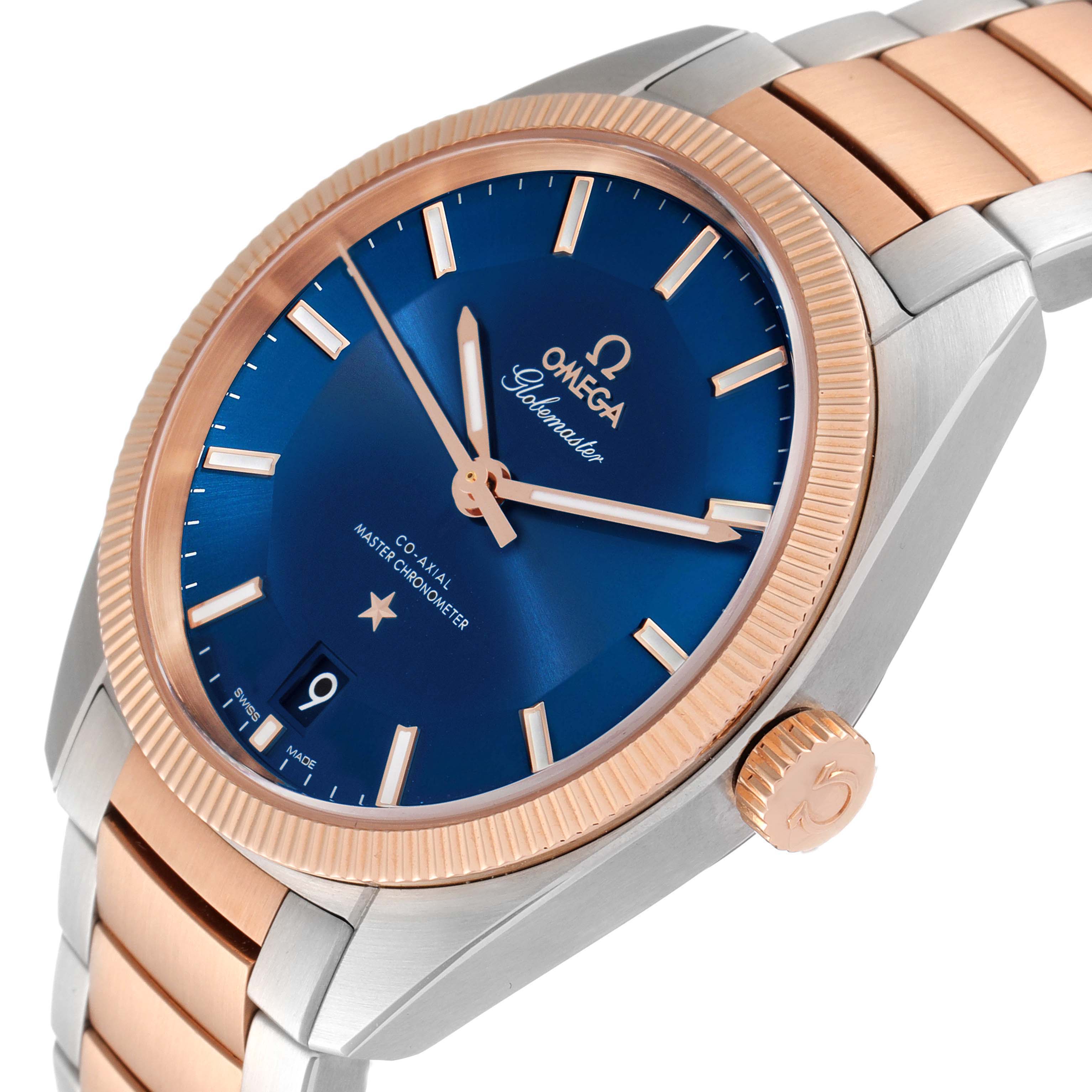 This Omega Constellation 130.20.39.21.03.001 Men's Steel and Gold (two tone) Blue Dial 130.20.39.21.03.001 Men's Steel and Gold (two tone) Blue Dial watch is shown at an angled close-up, highlighting its blue dial, rose gold bezel, and two-tone bracelet.