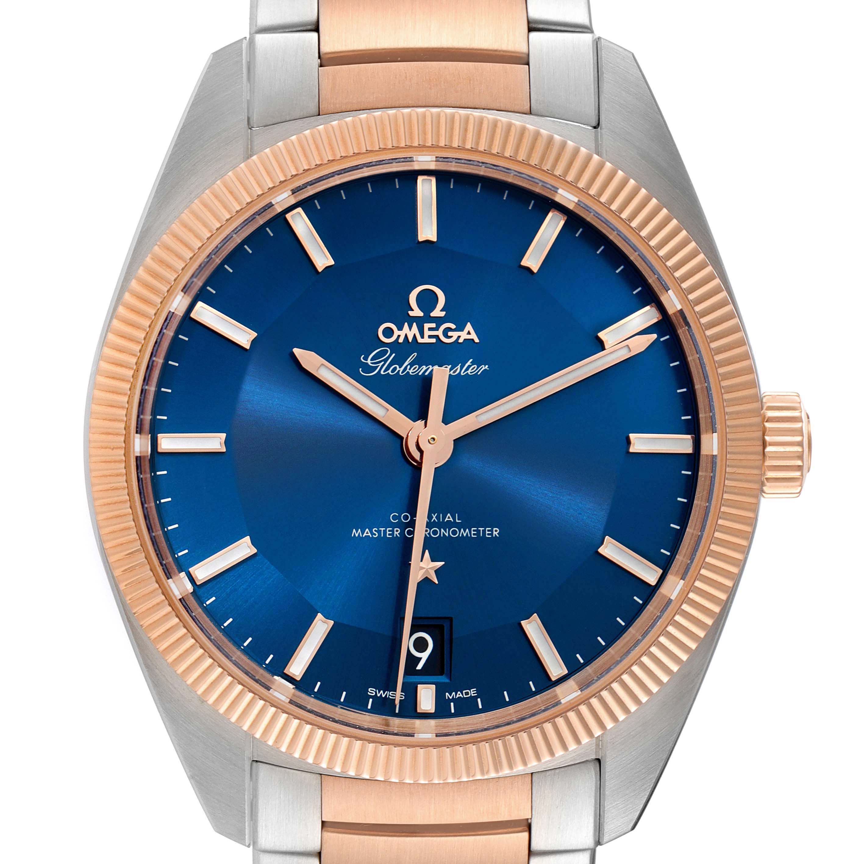 The Omega Constellation 130.20.39.21.03.001 Men's Steel and Gold (two tone) Blue Dial 130.20.39.21.03.001 Men's Steel and Gold (two tone) Blue Dial Glashutte model is shown from a top-down angle, displaying its blue dial, gold markers, and partial bracelet.