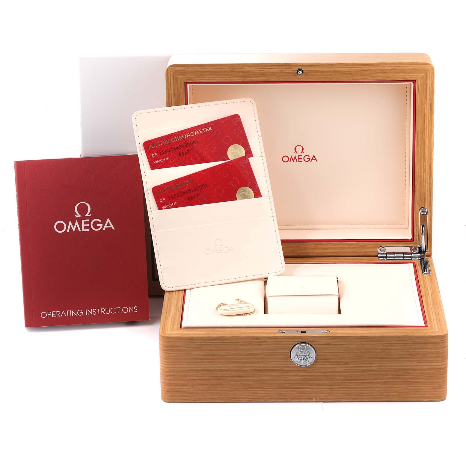 The image displays the accessories for an Omega Planet Ocean 215.32.46.51.01.001 Men
s Stainless Steel Black Dial 215.32.46.51.01.001 Men
s Stainless Steel Black Dial watch, including the watch box, operating instructions, and warranty cards.