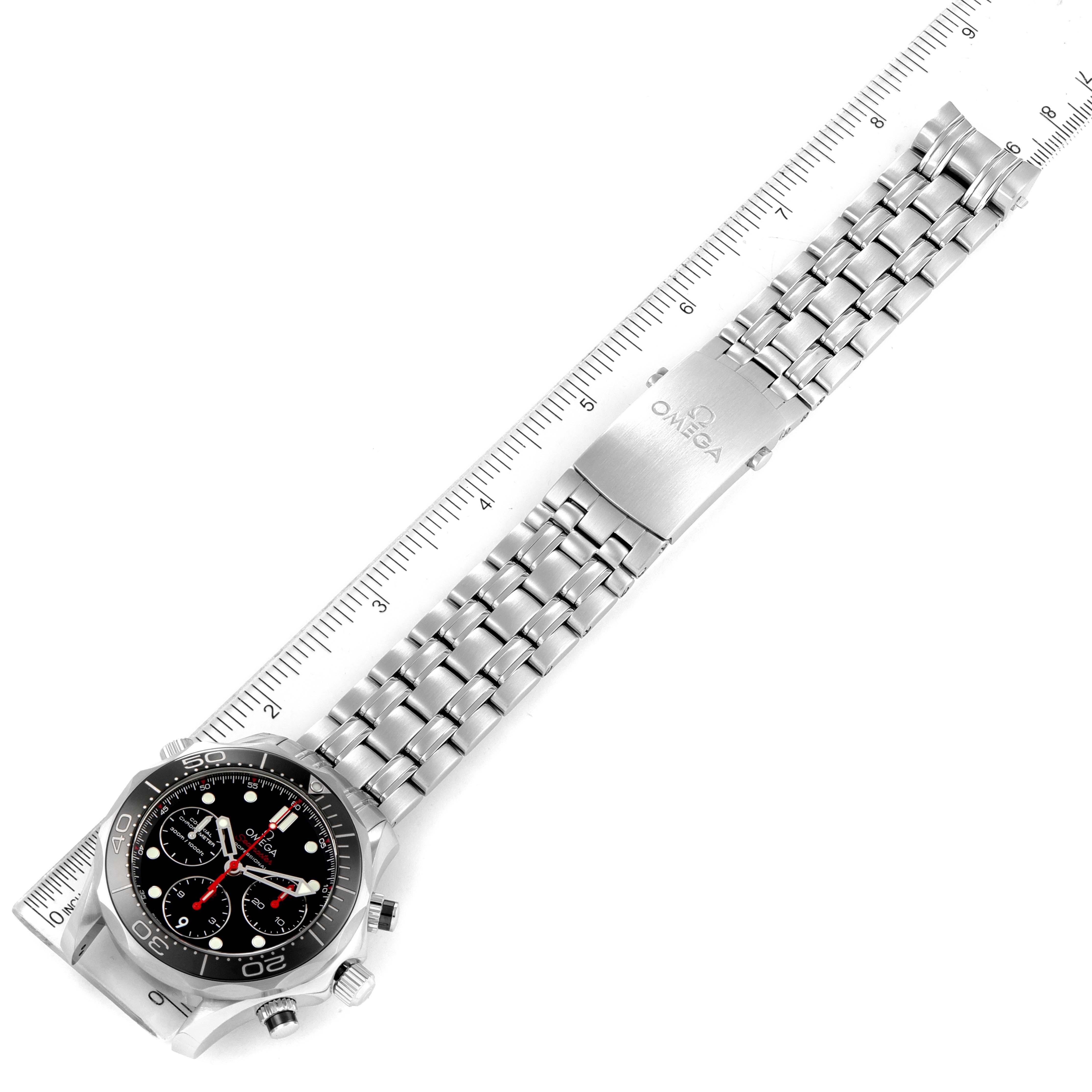 The image shows an Omega Seamaster 212.30.42.50.01.001 Men's Stainless Steel Black Dial 212.30.42.50.01.001 Men's Stainless Steel Black Dial watch laid flat, highlighting the band with a ruler for measurement.