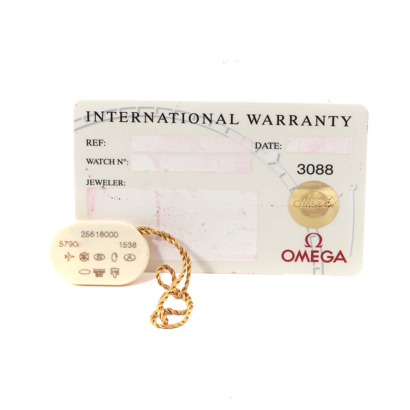 The image shows the international warranty card and tag for the Omega Seamaster 2561.80.00 Men
s Stainless Steel Blue Dial 2561.80.00 Men
s Stainless Steel Blue Dial watch.