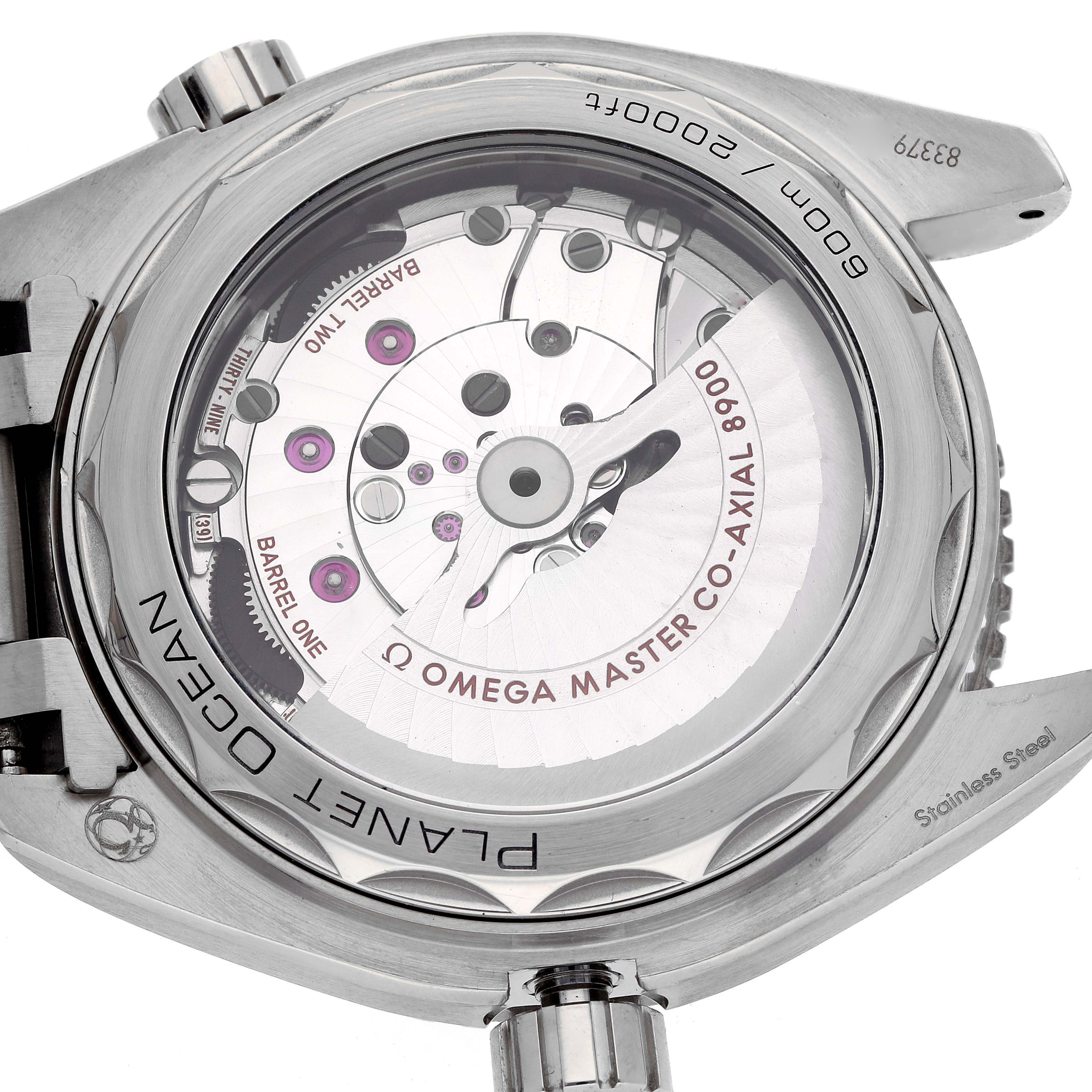 The image shows the back of an Omega Planet Ocean 215.30.44.21.01.001 Men
s Stainless Steel Black Dial 215.30.44.21.01.001 Men
s Stainless Steel Black Dial watch, displaying its movement and rotor through a transparent case back.