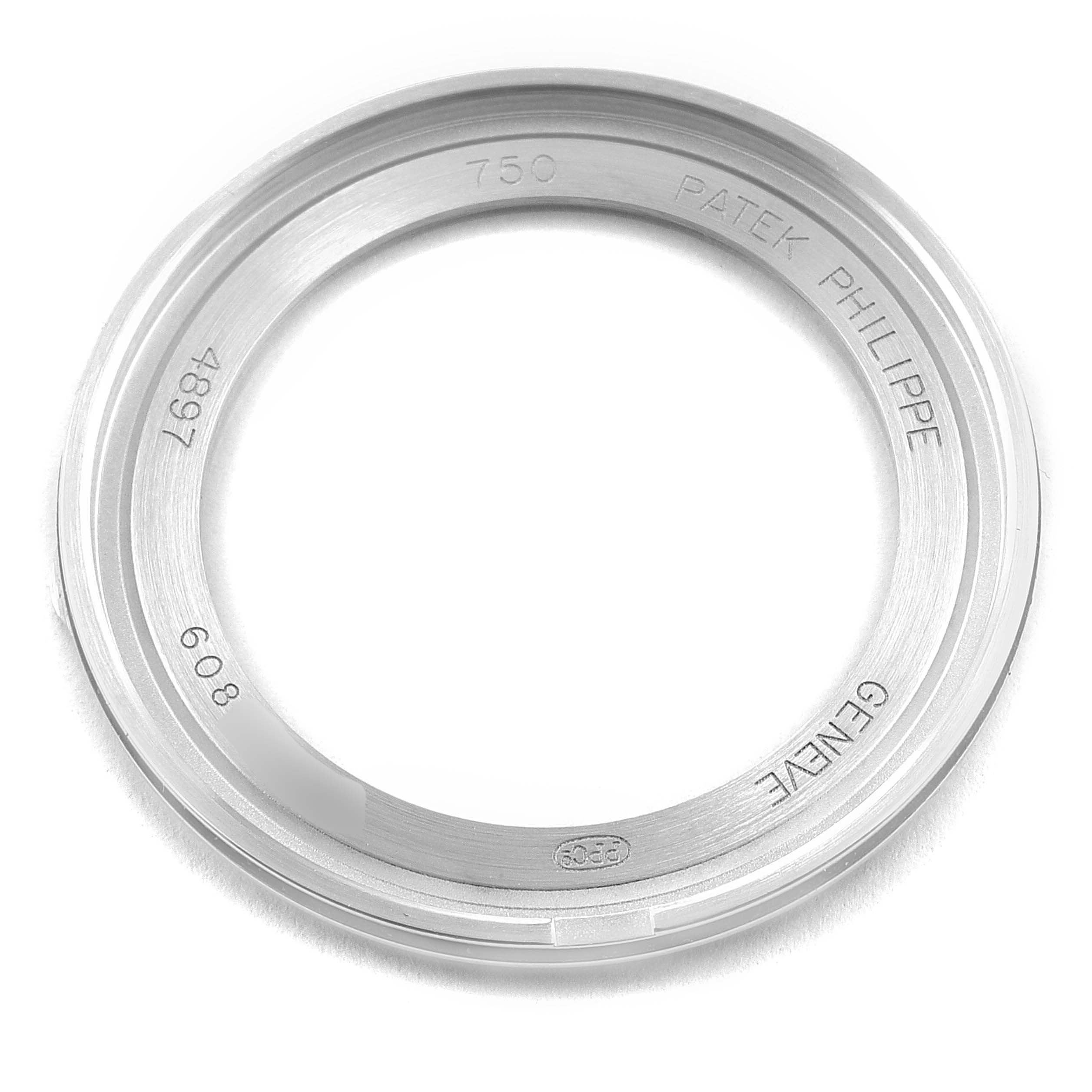 The image shows the back case ring of a Patek Philippe Calatrava 4897G-001 Women's White Gold Blue Dial 4897G-001 Women's White Gold Blue Dial watch, viewed from a top-down angle.