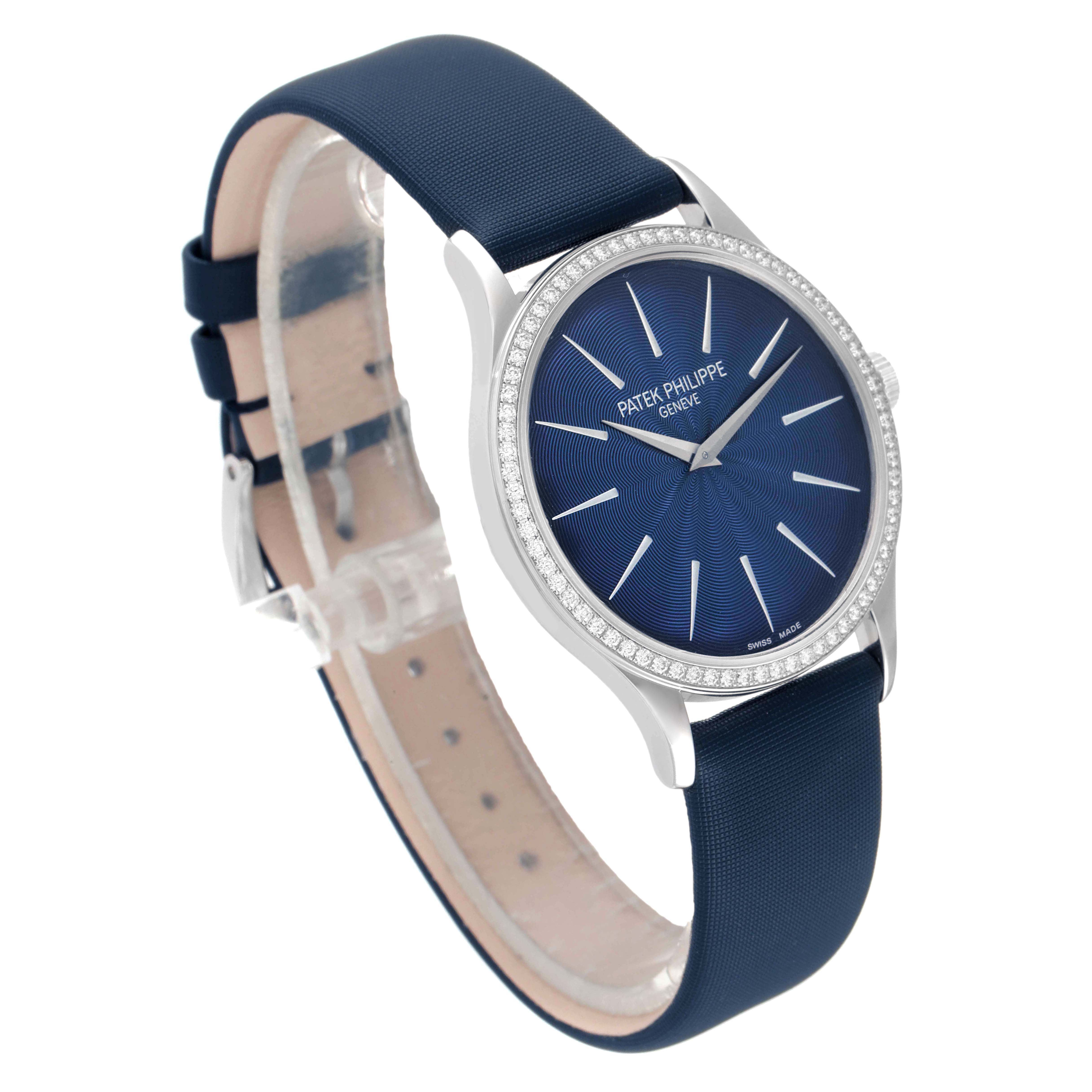 This image shows a front angle view of the Patek Philippe Calatrava 4897G-001 Women's White Gold Blue Dial 4897G-001 Women's White Gold Blue Dial watch, highlighting its blue dial, bezel, and strap.