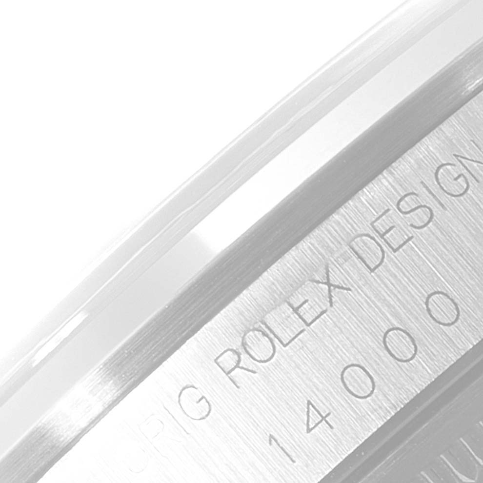 This image shows a close-up side view of the casing with engraved text on a Rolex Air-King 14000 Men's Stainless Steel Blue Dial 14000 Men's Stainless Steel Blue Dial watch.