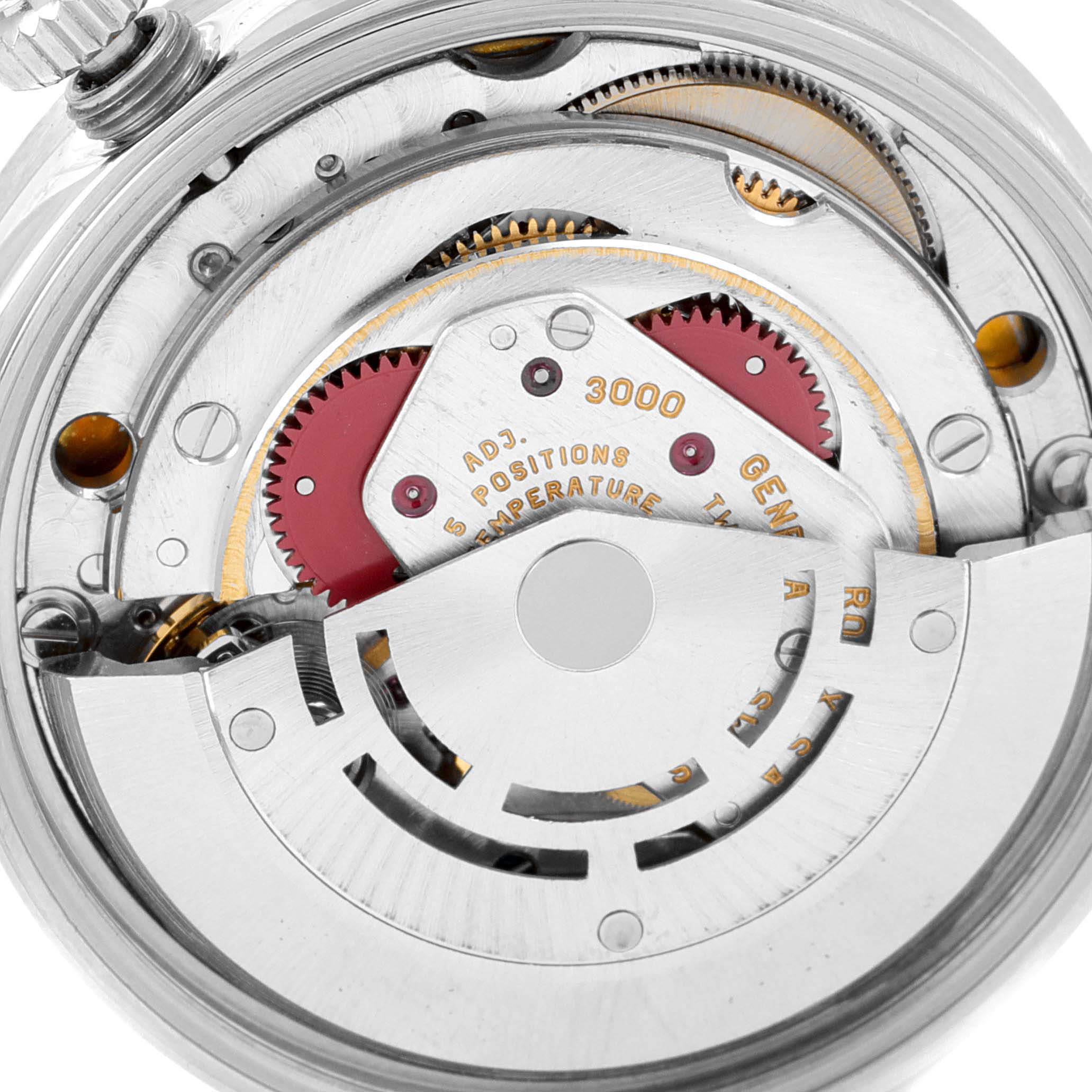 The image shows a close-up view of the Rolex Air-King 14010 Men's Stainless Steel Blue Dial 14010 Men's Stainless Steel Blue Dial watch's internal movement and gears.