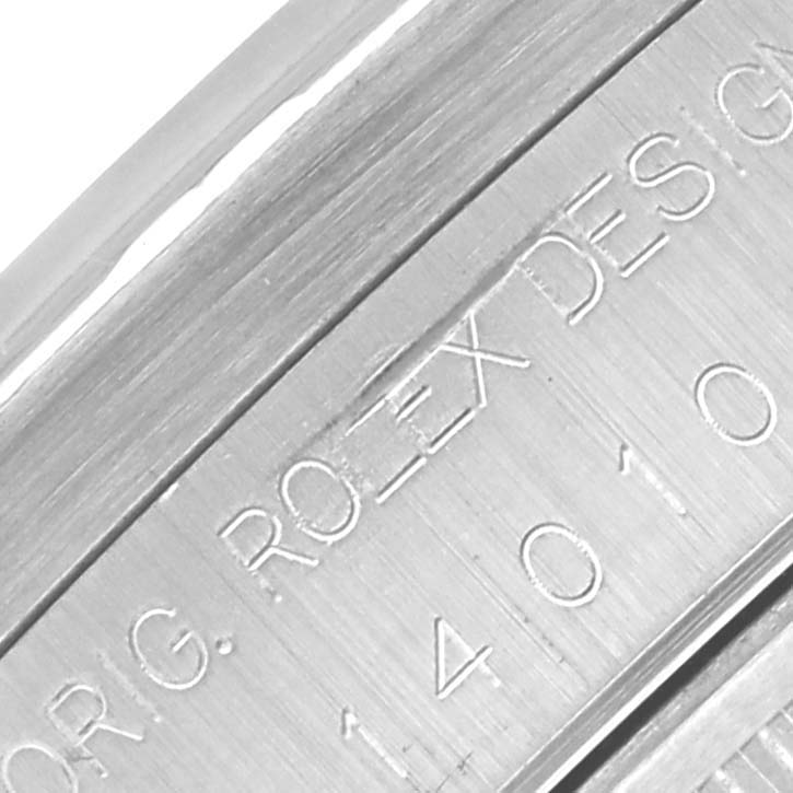The image shows a close-up of the engraving on the inner bezel of a Rolex Air-King 14010 Men's Stainless Steel White Dial 14010 Men's Stainless Steel White Dial watch.