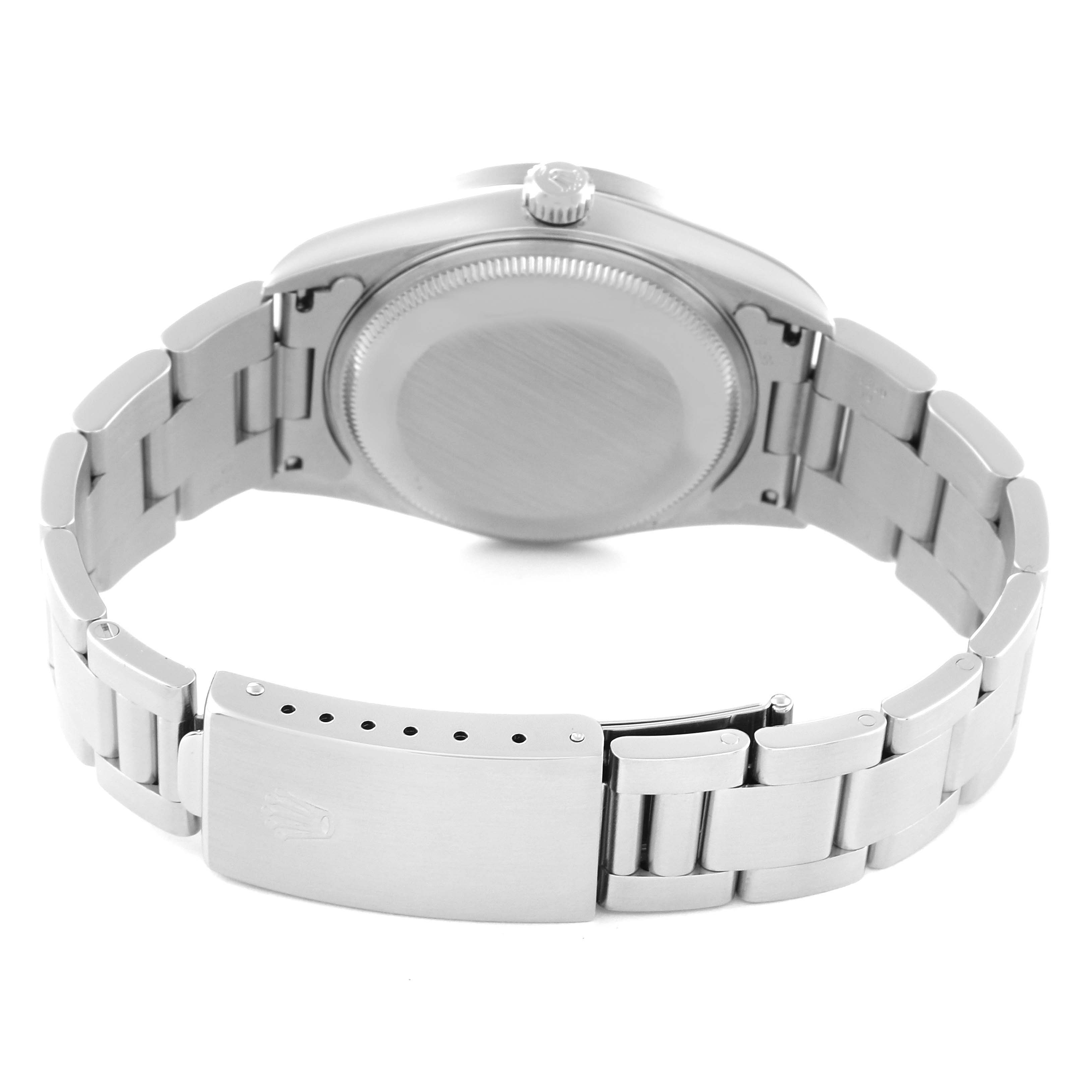 The image shows the back view of the Rolex Air-King 14010 Men's Stainless Steel Blue Dial 14010 Men's Stainless Steel Blue Dial watch, focusing on the case back, crown, and bracelet clasp.