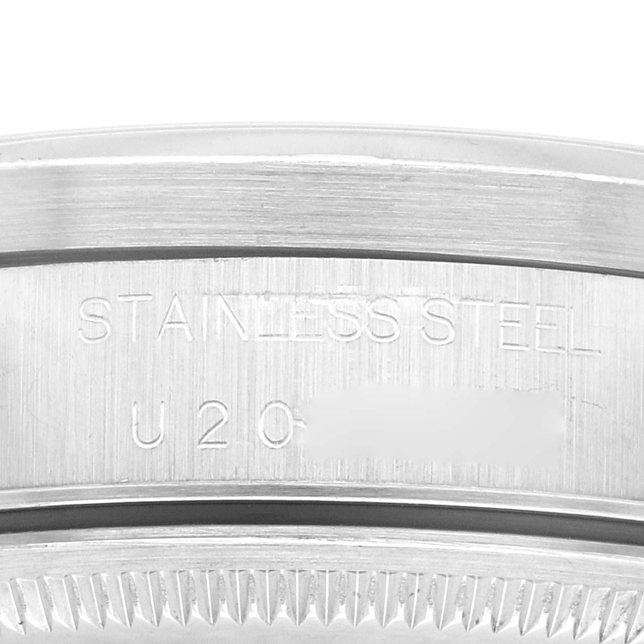 This image shows a close-up of the case back and engravings on a Rolex Air-King 14010 Men's Stainless Steel Blue Dial 14010 Men's Stainless Steel Blue Dial watch.