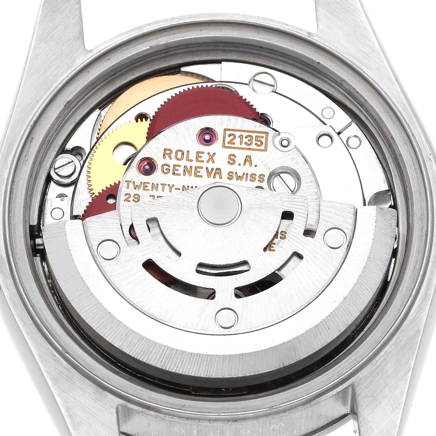 The image shows the movement of a Rolex Date 69160 Women's Stainless Steel Blue Dial 69160 Women's Stainless Steel Blue Dial model from the back, revealing its intricately crafted internal components.