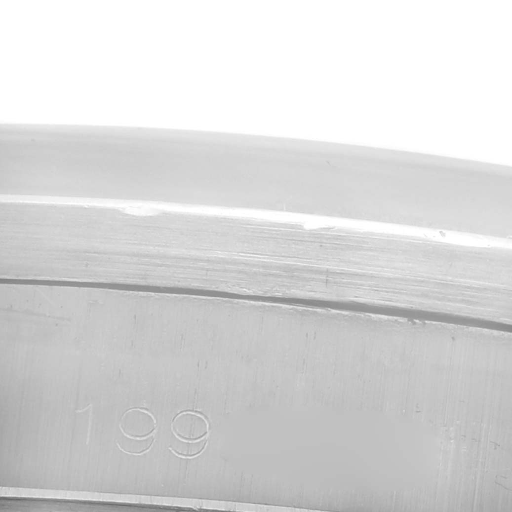 The image shows the engraved inner case of a Rolex Date 1501 Men's Stainless Steel Silver Dial 1501 Men's Stainless Steel Silver Dial watch viewed up close.