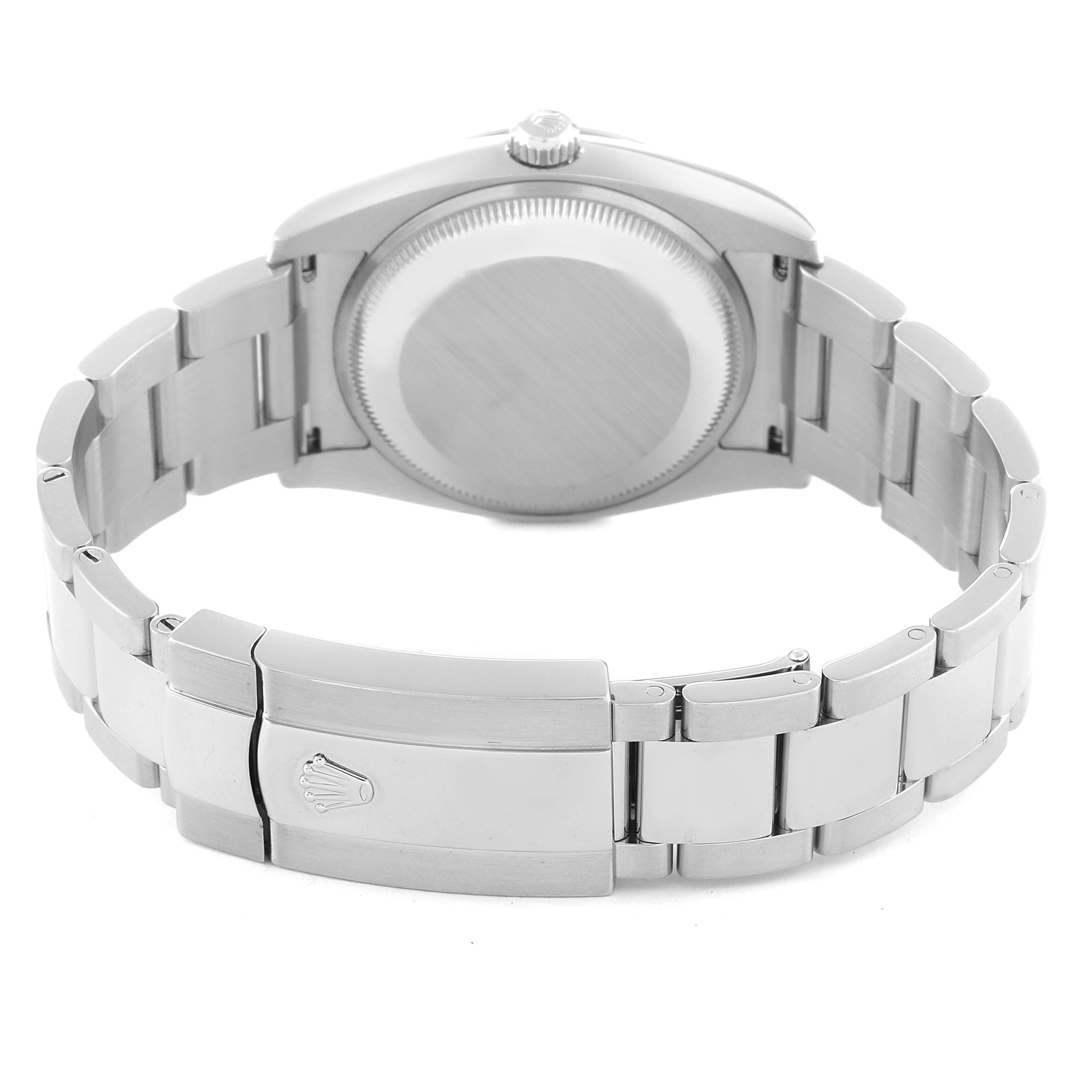 The image shows the back view of a Rolex Date 115200 Men's Stainless Steel Blue Dial 115200 Men's Stainless Steel Blue Dial model watch, highlighting the bracelet and the clasp with the Rolex logo.