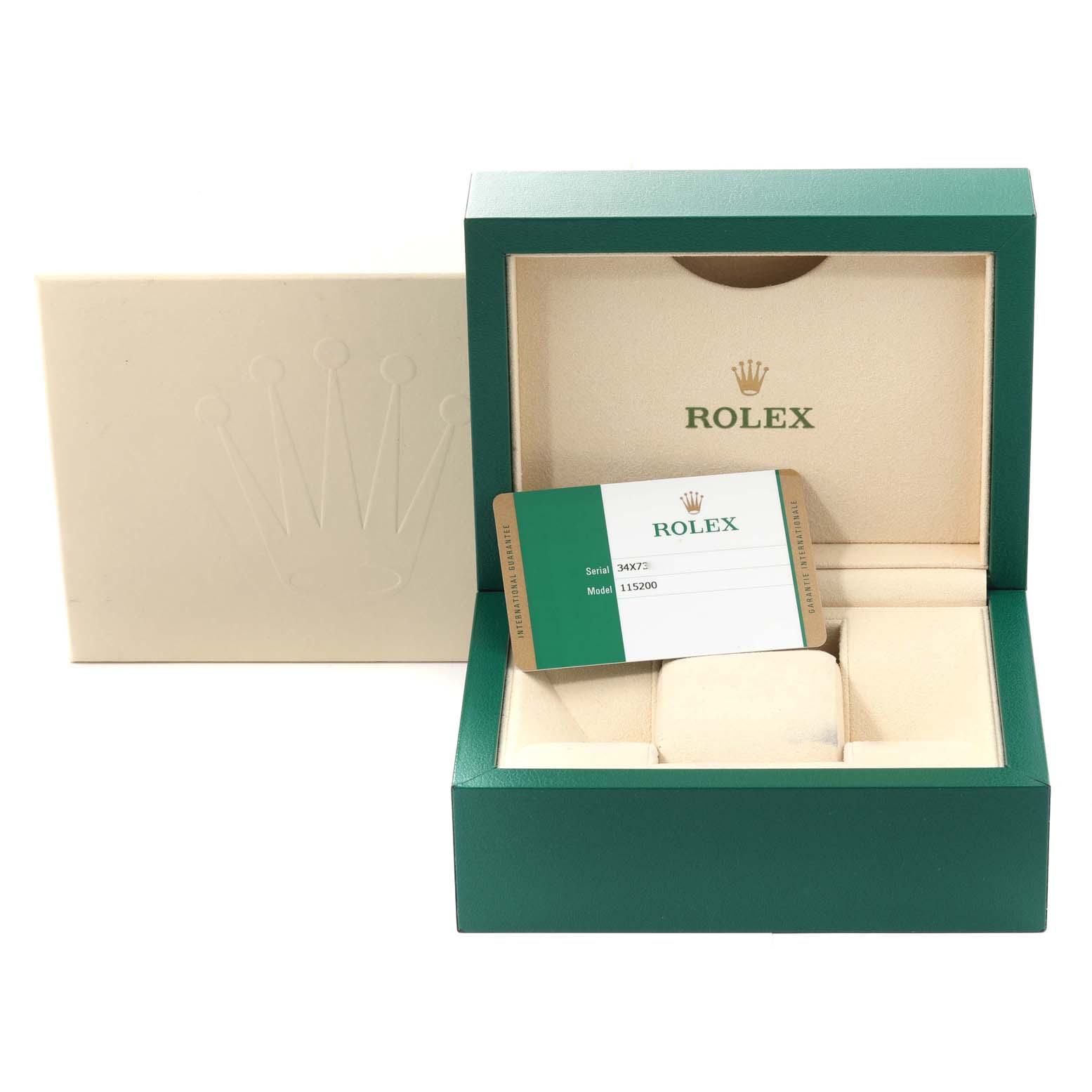 The image shows the open box and certificate for a Rolex Date 115200 Men's Stainless Steel Blue Dial 115200 Men's Stainless Steel Blue Dial model watch.