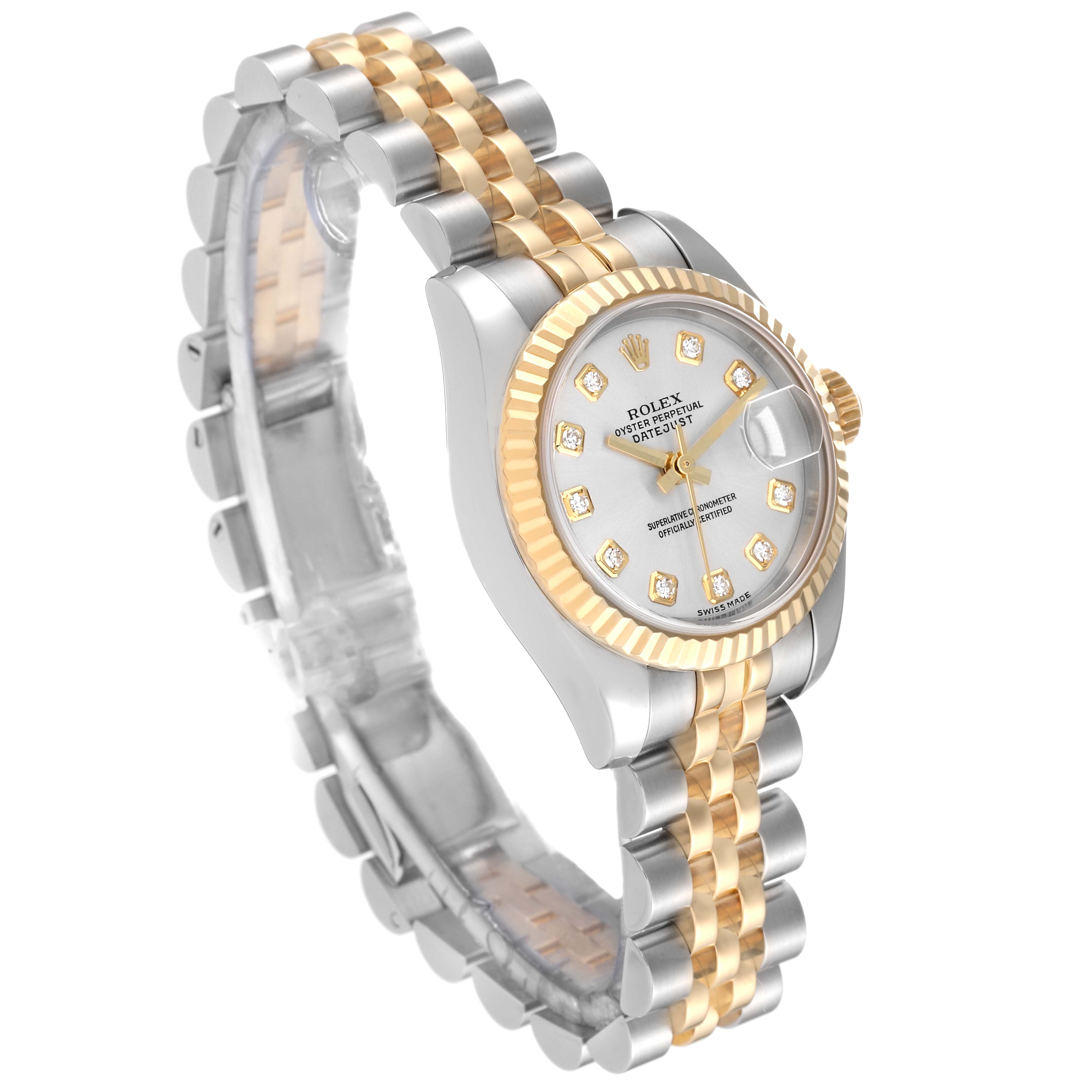 The image shows a Rolex Datejust 179173 Women's Steel and Gold (two tone) Silver Dial 179173 Women's Steel and Gold (two tone) Silver Dial watch at an angle emphasizing its dial, fluted bezel, and two-tone jubilee bracelet.