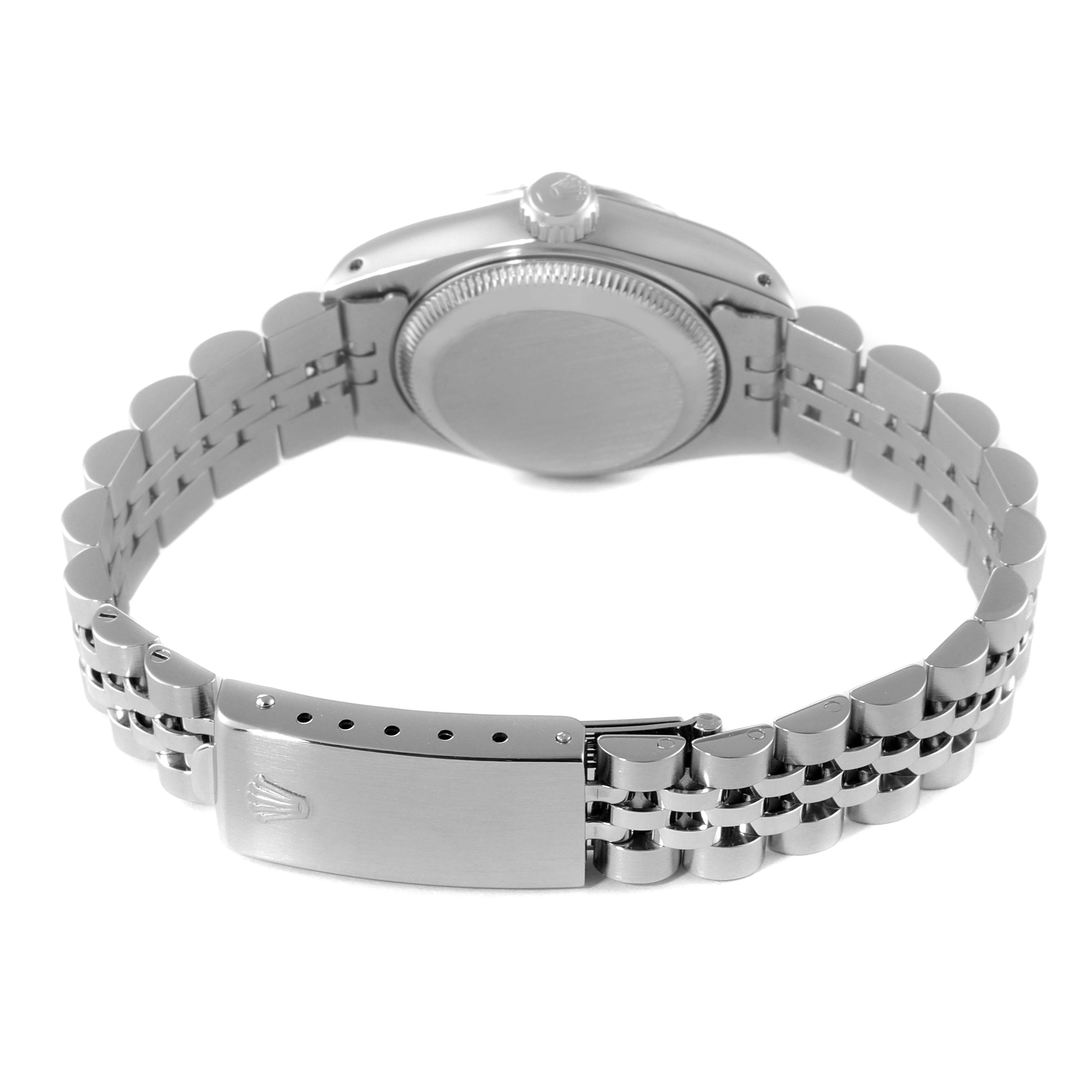 The image shows the back view of a Rolex Datejust 69174 Women's Stainless Steel Black Dial 69174 Women's Stainless Steel Black Dial watch, highlighting the bracelet, clasp, and caseback.