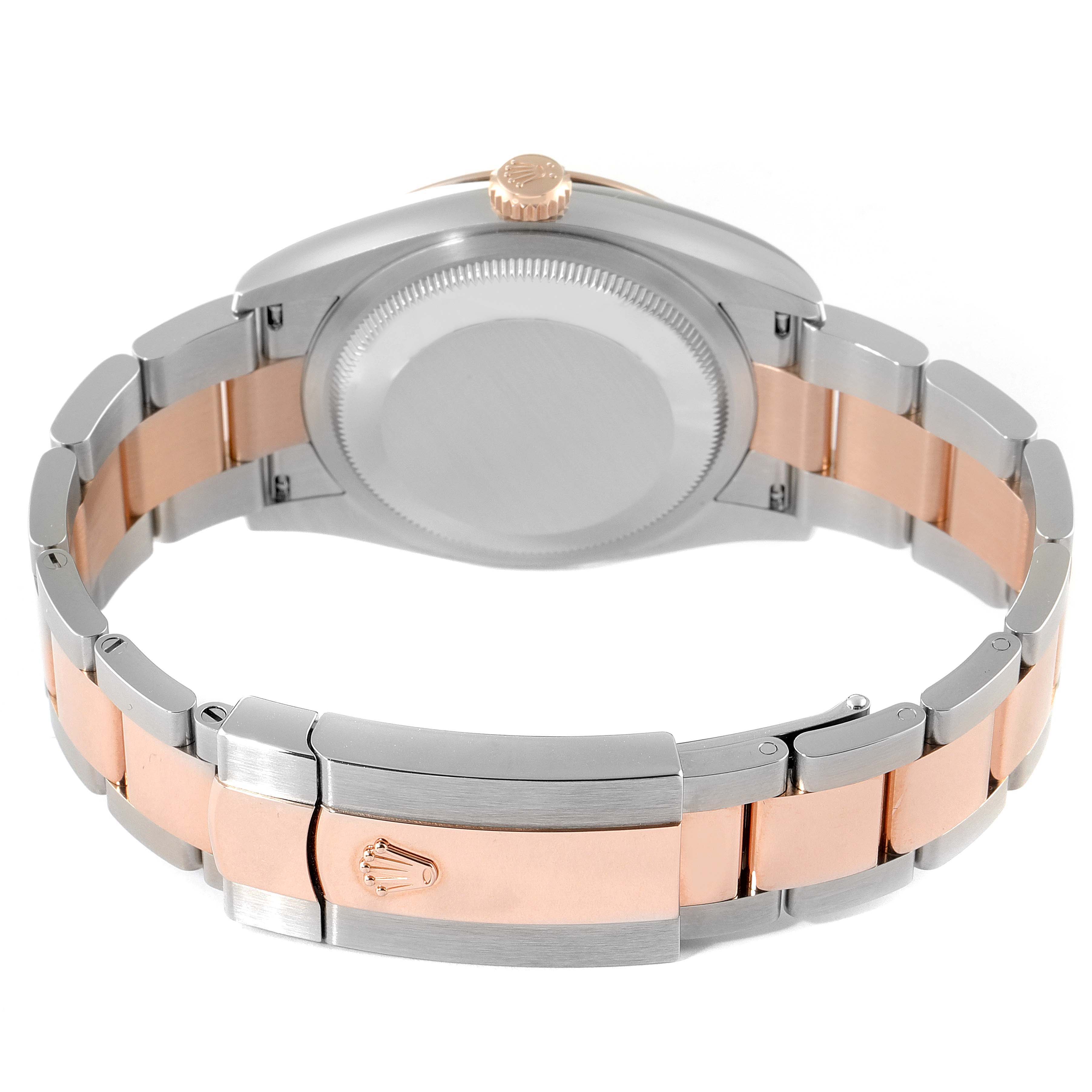 The image shows the back and bracelet of a Rolex Datejust 126201 Men
s Steel and Gold (two tone) Silver Dial 126201 Men
s Steel and Gold (two tone) Silver Dial, highlighting the clasp and case back.