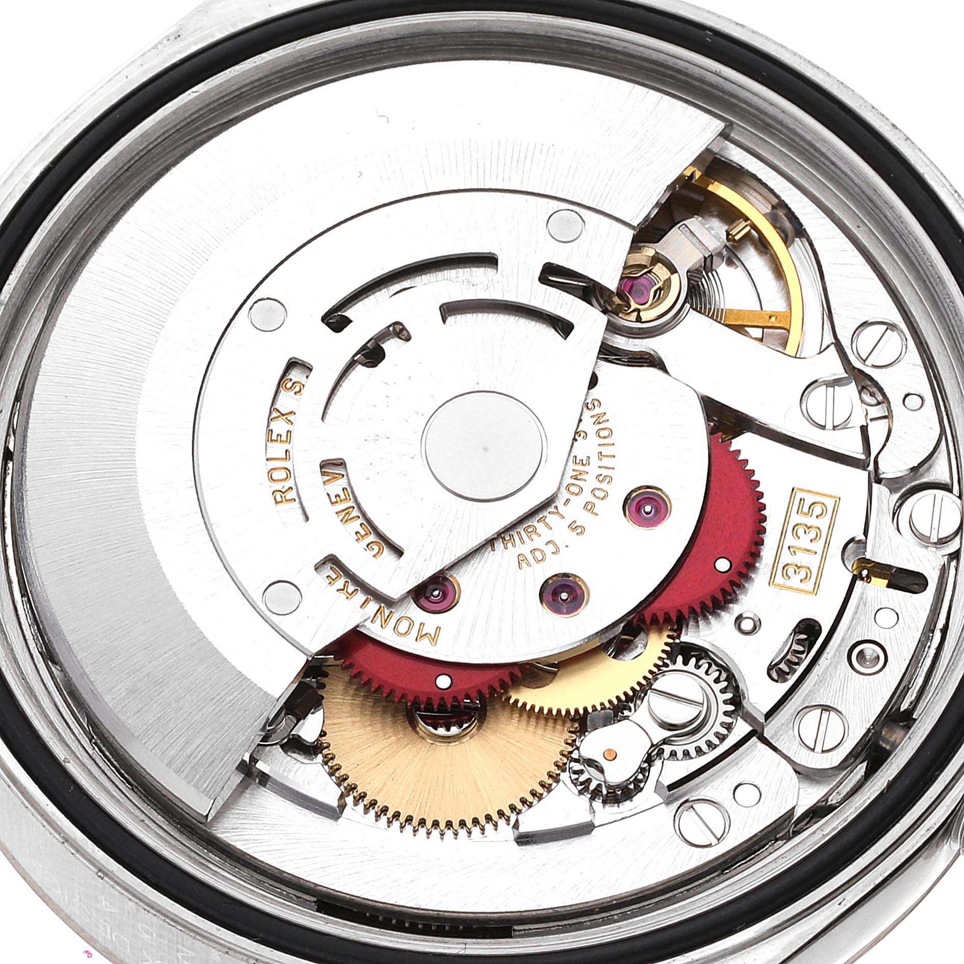 This image shows the Rolex Datejust 16234 Men's Stainless Steel Blue Dial 16234 Men's Stainless Steel Blue Dial's movement mechanism from the back, displaying gears and intricate components.