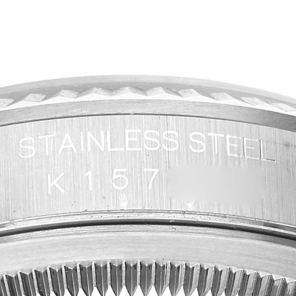 The image shows a close-up of the stainless steel casing and part of the bezel of a Rolex Datejust 16234 Men's Stainless Steel Blue Dial 16234 Men's Stainless Steel Blue Dial model.