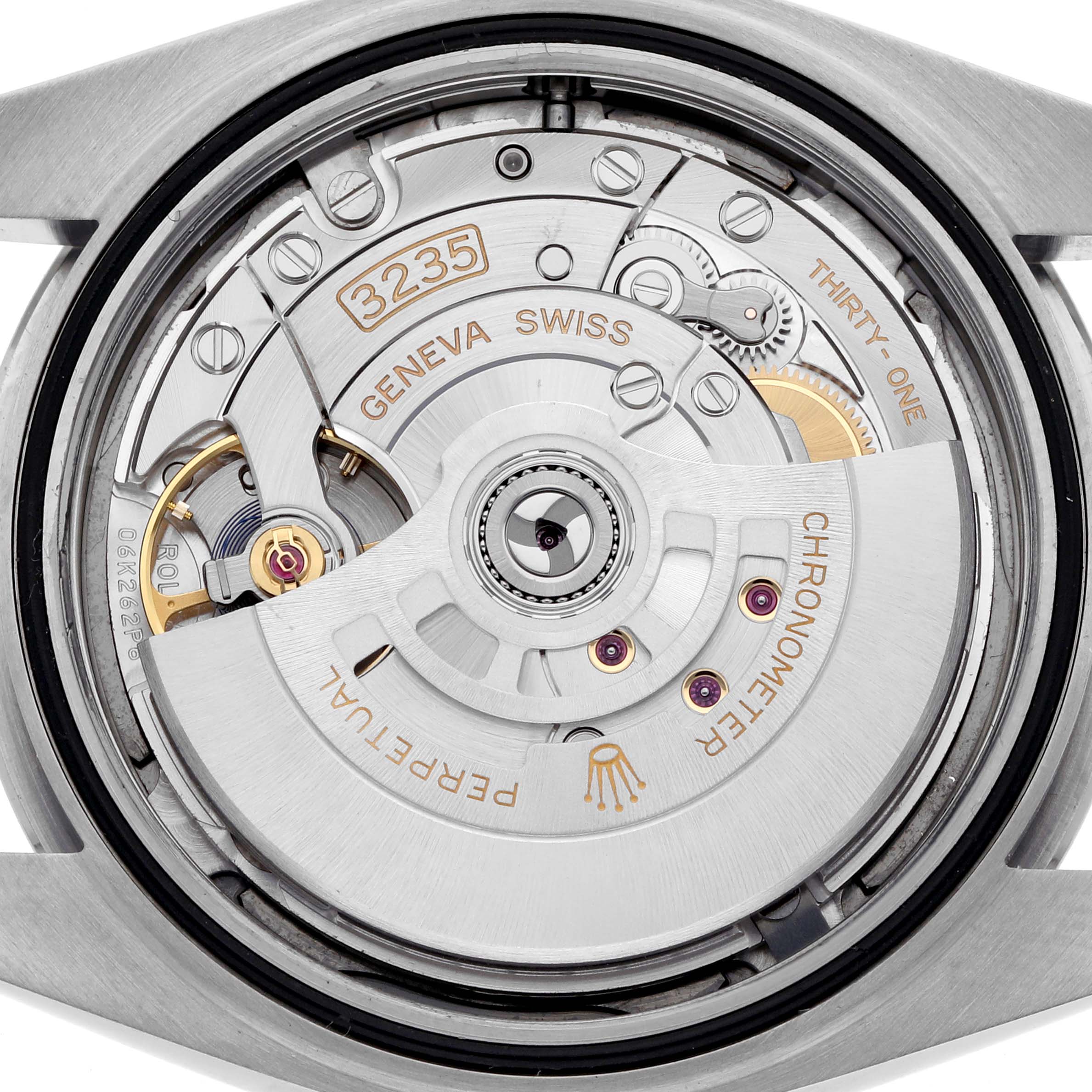 The image shows the movement of the Rolex Datejust 41 126300 Men's Stainless Steel Grey Dial 126300 Men's Stainless Steel Grey Dial, viewed from the back, highlighting the intricate mechanism components.