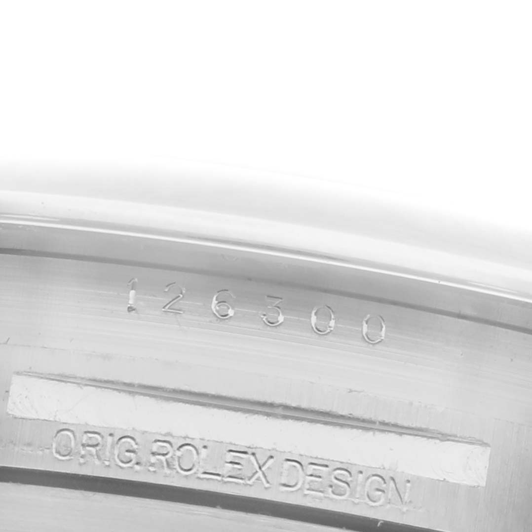 The image shows the inner bezel of a Rolex Datejust 41 126300 Men's Stainless Steel Grey Dial 126300 Men's Stainless Steel Grey Dial, featuring engraved model details.