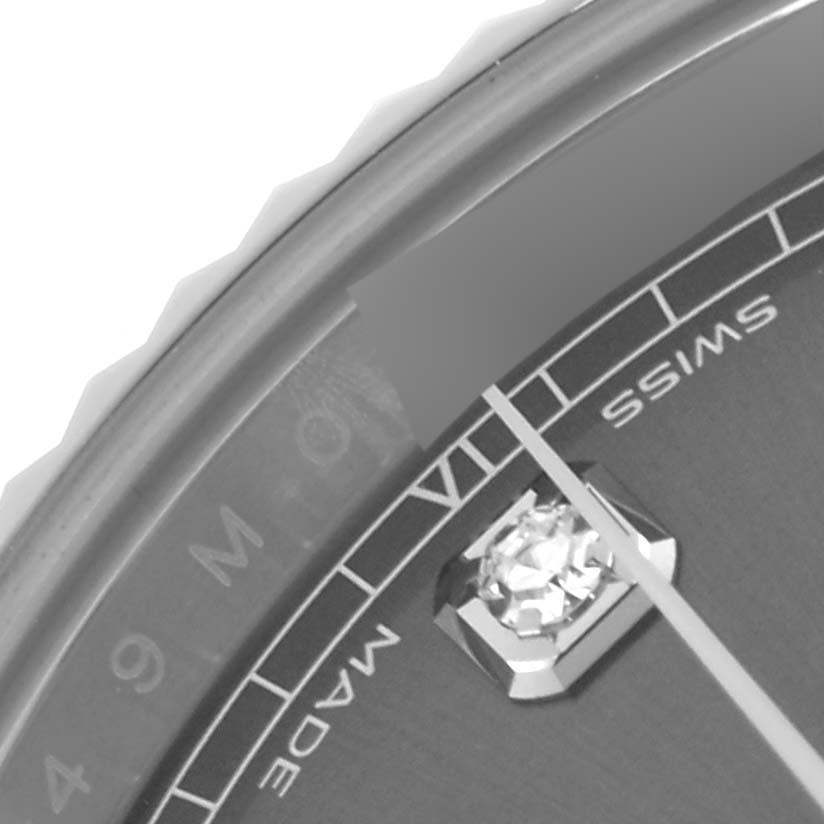 The image shows a close-up of the Rolex Datejust 41 126334 Men's Stainless Steel Grey Dial 126334 Men's Stainless Steel Grey Dial dial, highlighting the diamond hour marker and part of the bezel.