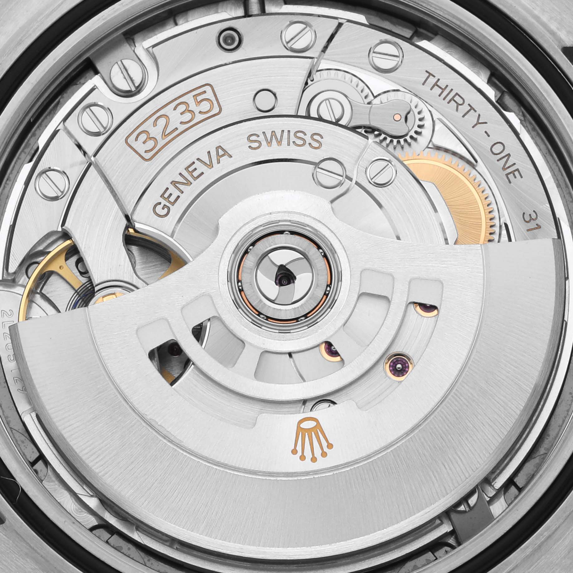 The image shows the movement of a Rolex Datejust 41 126334 Men's Stainless Steel Grey Dial 126334 Men's Stainless Steel Grey Dial, highlighting the intricate details of the caliber 3235.