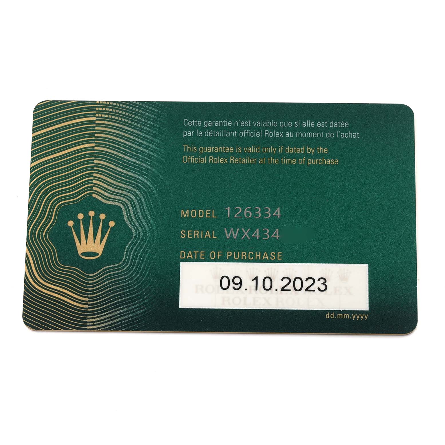 The image shows a flat view of a green Rolex warranty card for the Datejust 41 model, displaying model and serial numbers.