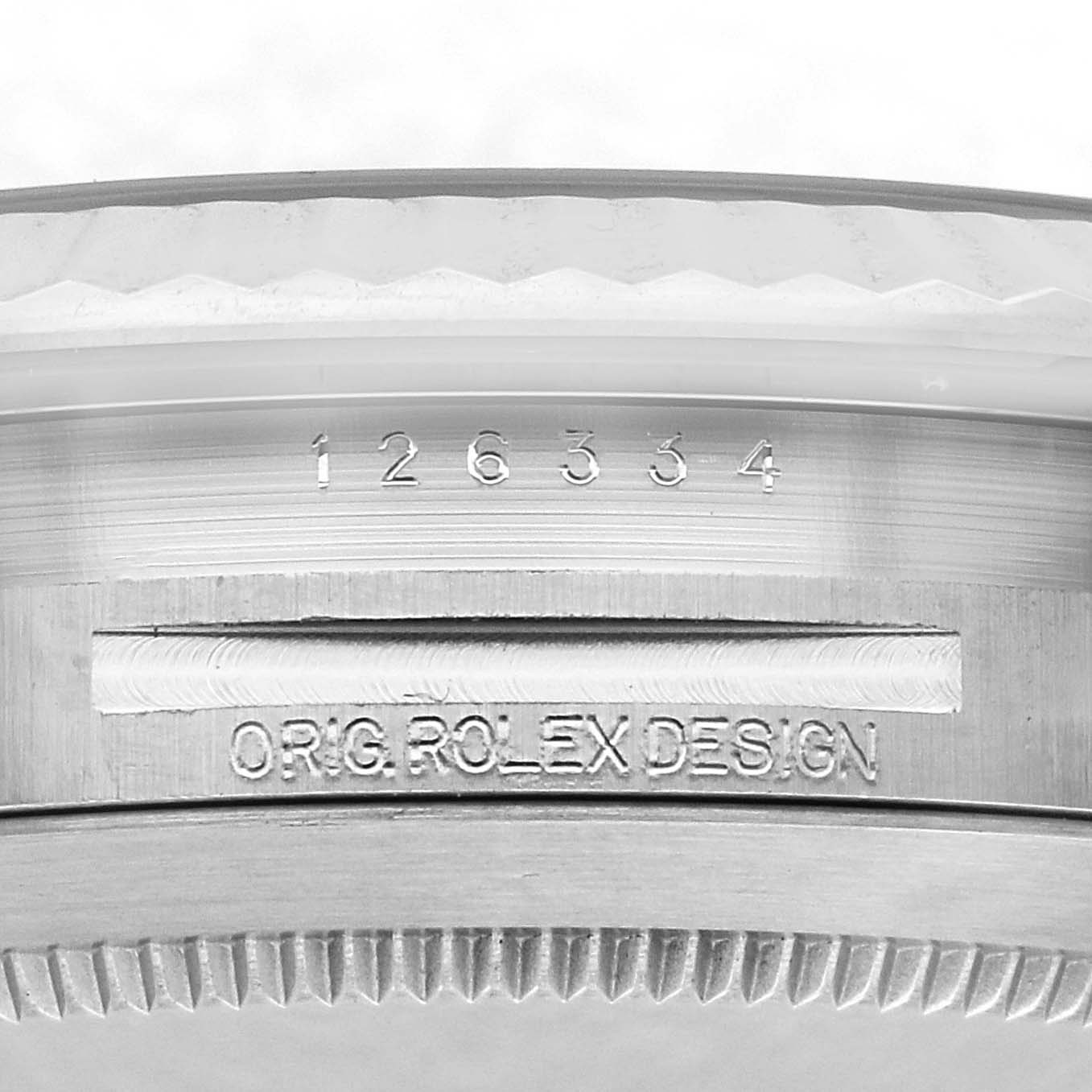 The image shows a close-up of the engraving on the case side of a Rolex Datejust 41 126334 Men's Stainless Steel Grey Dial 126334 Men's Stainless Steel Grey Dial, displaying the model number and "ORIG. ROLEX DESIGN."