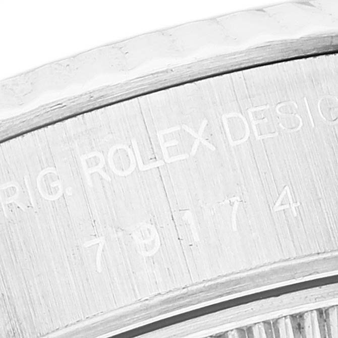 This close-up image shows the engraved inner bezel of a Rolex Datejust 79174 Women's Stainless Steel Mother of Pearl Dial 79174 Women's Stainless Steel Mother of Pearl Dial watch.