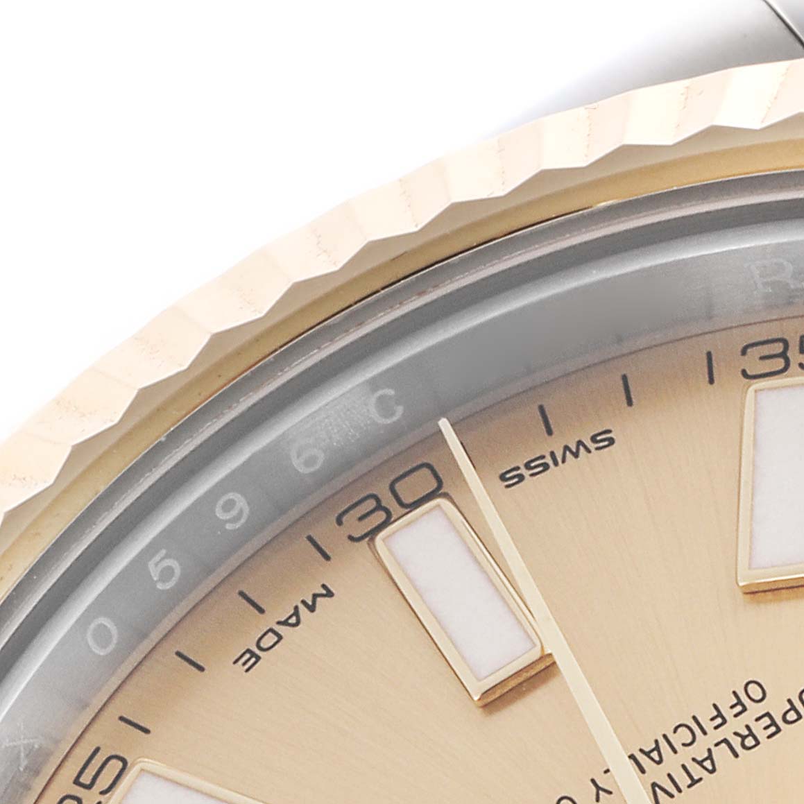 The image shows a close-up of the bezel and dial of the Rolex Datejust 41 116333 Men
s Steel and Gold (two tone) Champagne Dial 116333 Men
s Steel and Gold (two tone) Champagne Dial, highlighting the fluted bezel and indices.